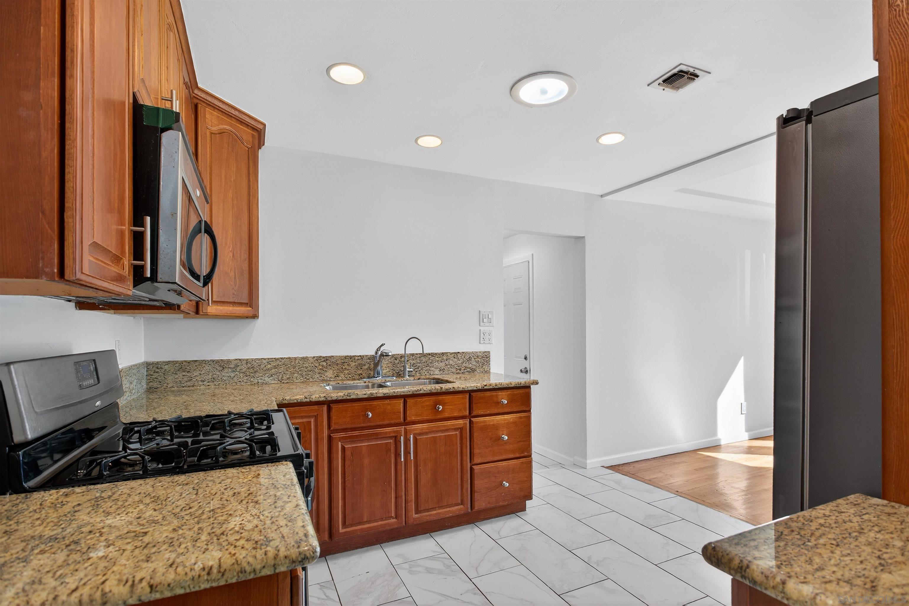 Detail Gallery Image 12 of 37 For 5442  San Onofre Ter, San Diego,  CA 92114 - 4 Beds | 3 Baths