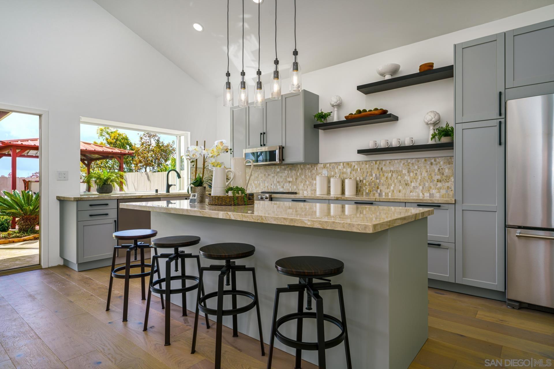 Detail Gallery Image 4 of 10 For 13472  Salmon River Rd, San Diego,  CA 92129 - 3 Beds | 2/1 Baths