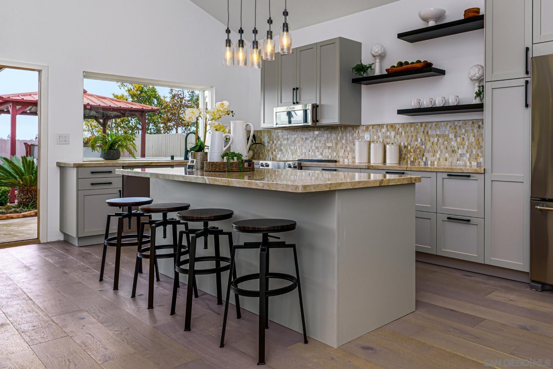 Detail Gallery Image 8 of 10 For 13472  Salmon River Rd, San Diego,  CA 92129 - 3 Beds | 2/1 Baths