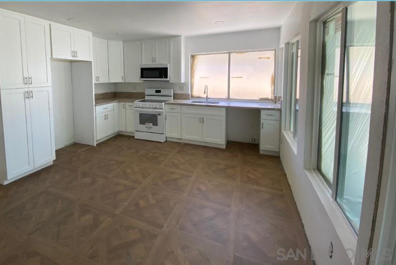 Detail Gallery Image 4 of 7 For 856  Misty Meadow Ct, Chula Vista,  CA 91910 - 6 Beds | 2/1 Baths