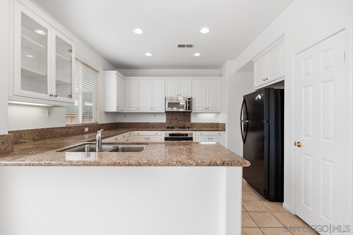 Detail Gallery Image 12 of 37 For 11553  Trailbrook Lane, San Diego,  CA 92128 - 4 Beds | 2/1 Baths