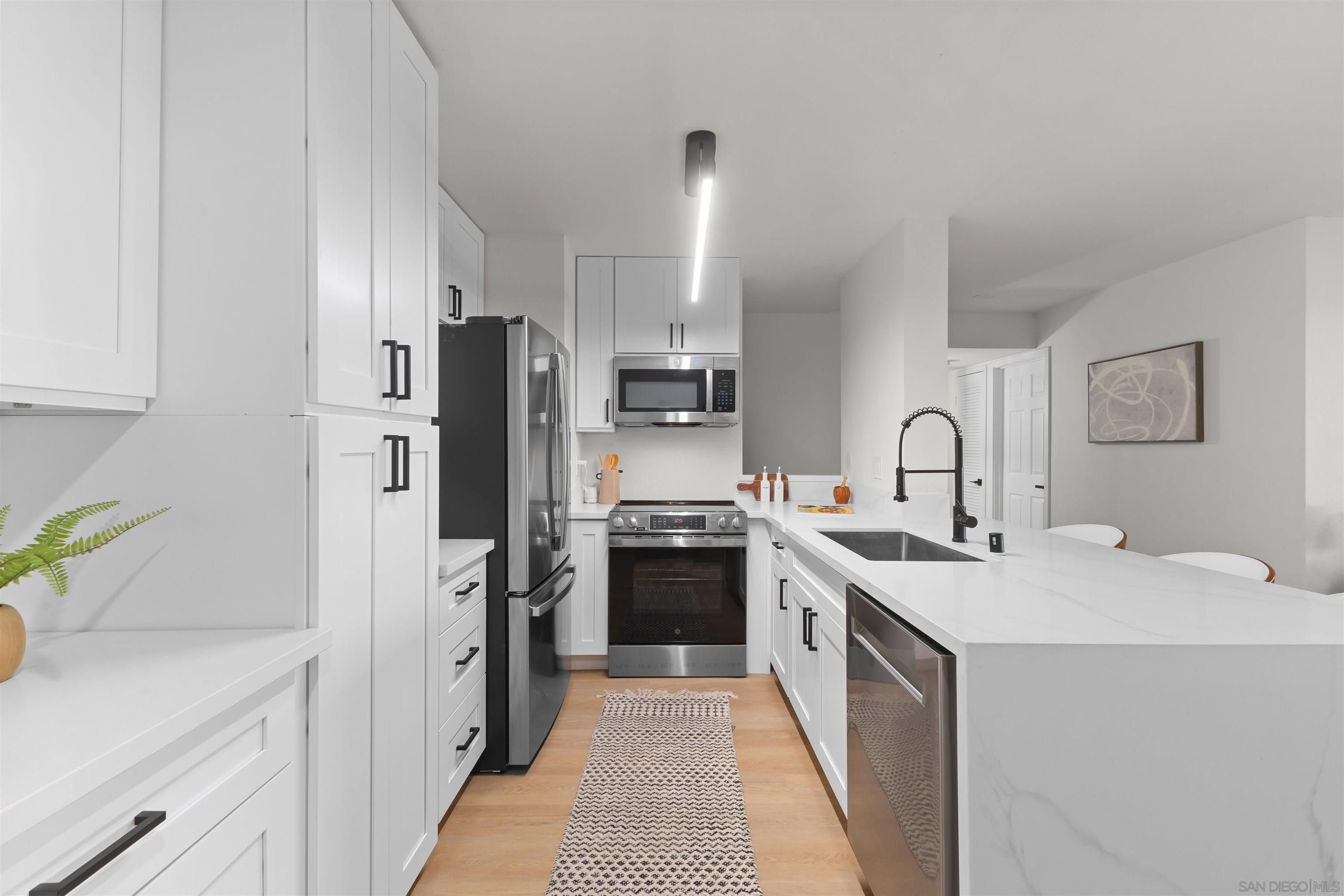 Detail Gallery Image 11 of 23 For 10225  Caminito Cuervo  #125,  San Diego,  CA 92108 - 2 Beds | 2 Baths