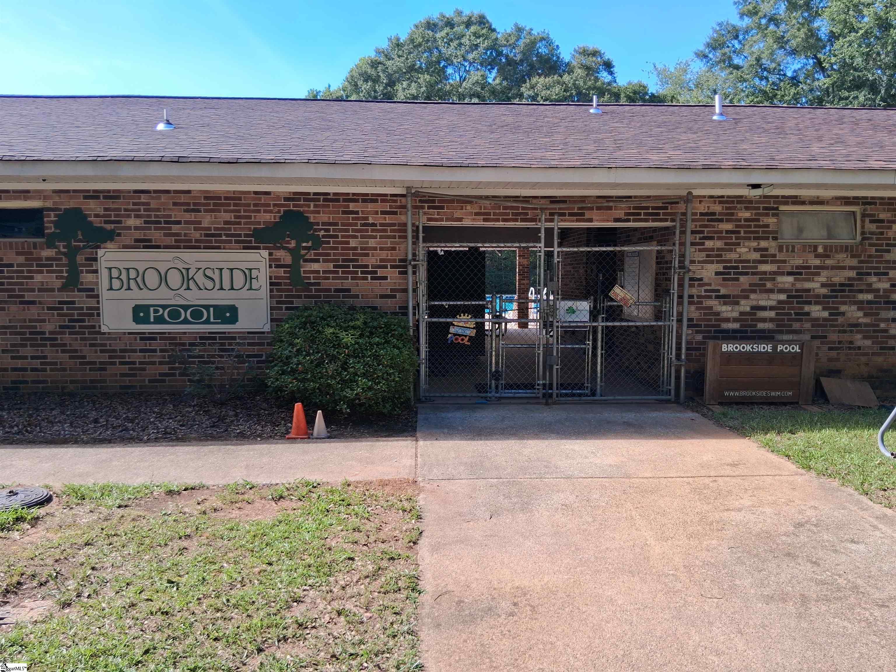 A Truly Unique Opportunity in Mauldin's Brookside Community!  Opportunities like this are exceptionally rare. Situated in the established Brookside subdivision, this freestanding recreational facility features a Junior Olympic-sized swimming pool, expansive pool deck, covered pavilion, clubhouse, and ample on-site parking.  Recent updates include a refinished pool deck along with new interior paint on the clubhouse walls and floors, creating a refreshed appearance and inviting atmosphere.  Whether you're an HOA seeking to add a premier amenity, a developer exploring community enhancements, an organization looking for a gathering space, or an investor with a creative vision, this property offers tremendous potential. The spacious layout is well-suited for swim programs, community events, recreational activities, seasonal gatherings, and much more.  Located in the heart of Mauldin with convenient access to shopping, dining, and major roadways, this distinctive property presents a chance to acquire an established recreational asset that simply cannot be replicated easily in today's market.  Bring your vision and discover the possibilities.