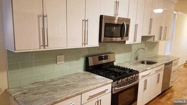 1208 67TH ST - Photo 2