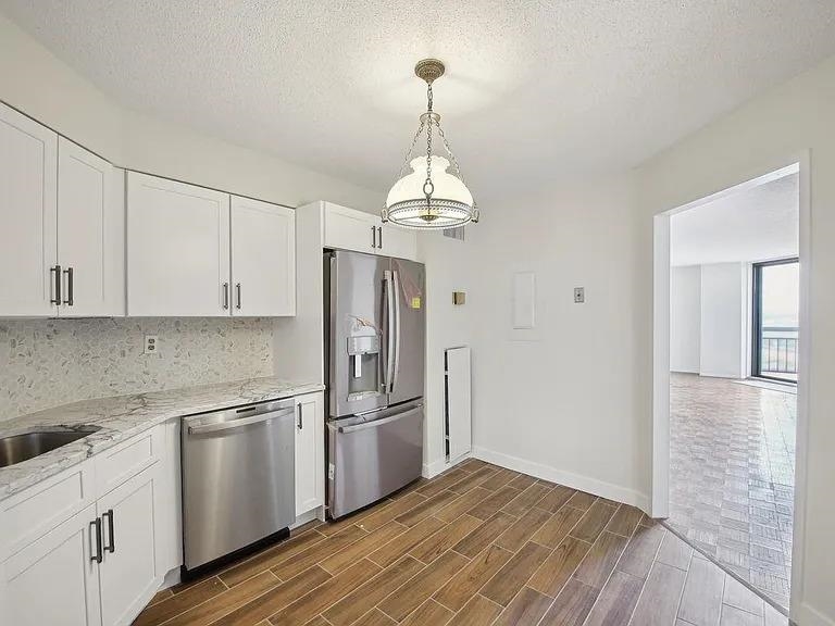 2138 HARMON COVE TOWER