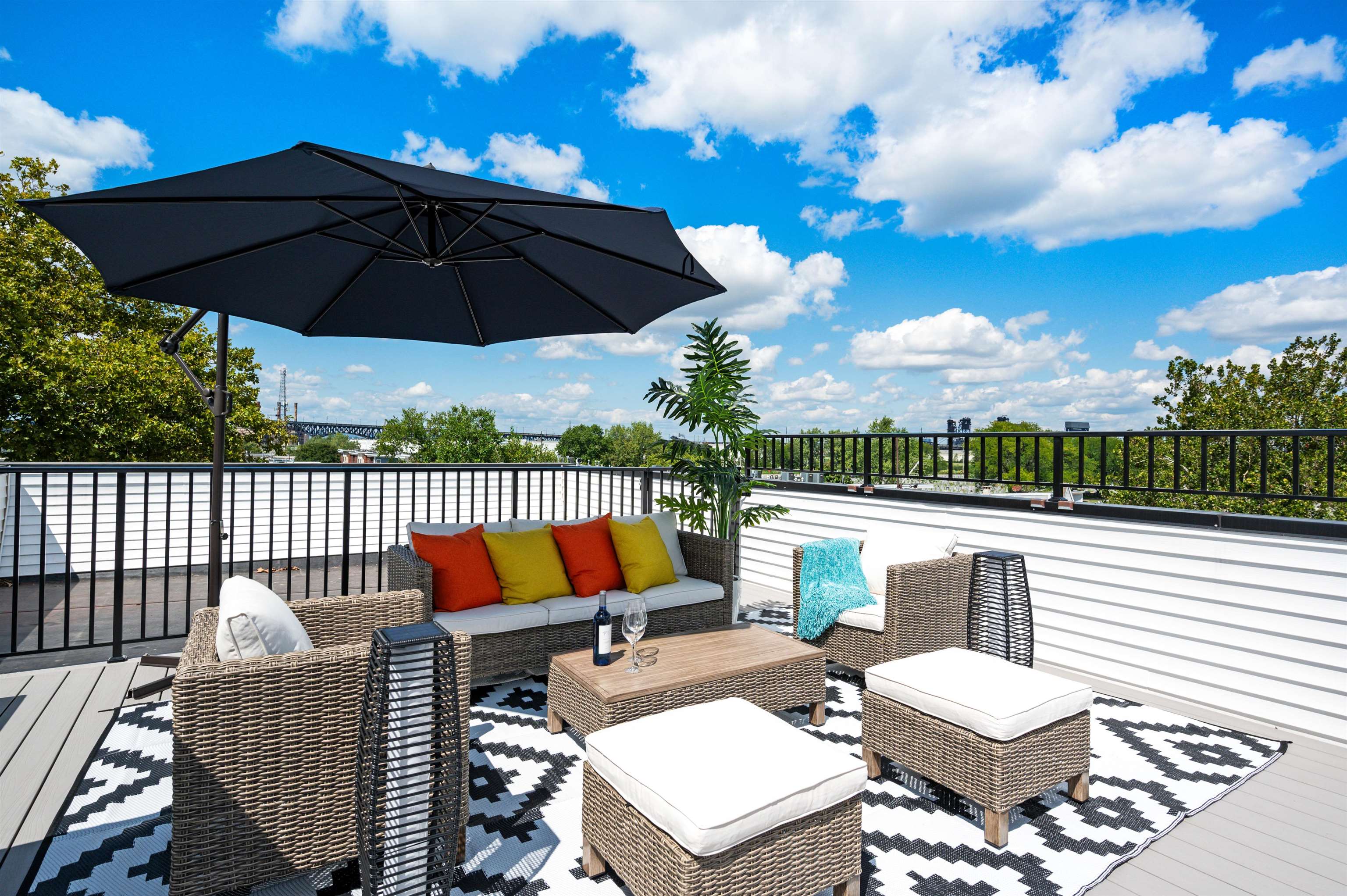 Experience elevated urban living in this newly constructed 3-bedroom, 2-bath home offering 1,500 sq ft of refined interior space and a private, 940 sq ft rooftop deck—your personal outdoor oasis with panoramic neighborhood views. Perfectly positioned near Journal Square, this residence blends designer finishes with the convenience of one of Jersey City’s most desirable and transit-friendly neighborhoods. Step inside to soaring 10-foot ceilings, 8-foot custom doors, and expansive floor-to-ceiling sliding glass doors that flood the home with natural light. Wide-plank Red Oak hardwood flooring flows throughout, creating a seamless, elevated atmosphere. The open-concept layout includes a chef-inspired kitchen featuring waterfall quartz countertops, custom cabinetry, and a full suite of premium stainless steel appliances—ideal for both everyday living and entertaining. The spacious primary suite offers a truly spa-like retreat with a beautifully appointed bathroom, premium tilework, and a relaxing ambiance. Two additional bedrooms provide flexibility for guests, a home office, or a growing household. Located just minutes from the Journal Square PATH, this home delivers effortless access to transportation, dining, shopping, and entertainment. The property is also just moments from Lincoln Park’s 273 acres of green space, lakes, trails, tennis courts, running tracks, golf facilities, and sports fields—one of Jersey City’s most iconic outdoor destinations. Blending luxury craftsmanship, exceptional outdoor space, and unbeatable convenience, Unit 2 at 220 Freeman Ave offers a rare opportunity to enjoy high-end living in a booming Jersey City community. Don’t miss the chance to experience this stunning home in person.