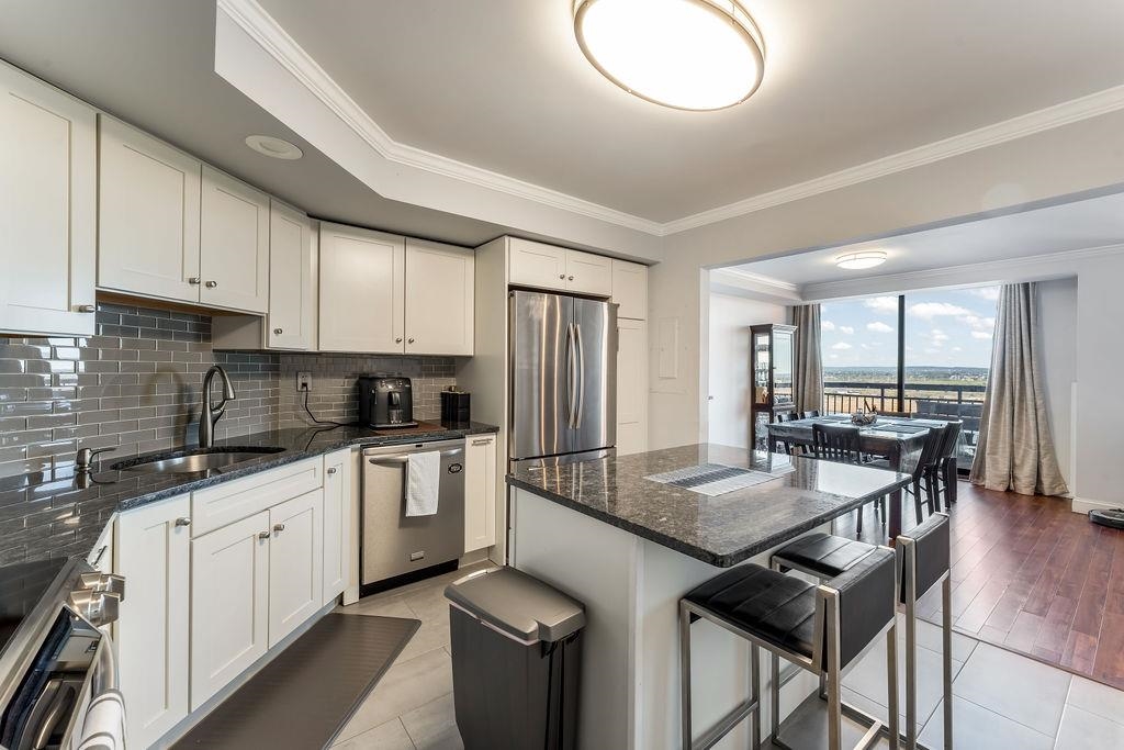 2110 HARMON COVE TOWER