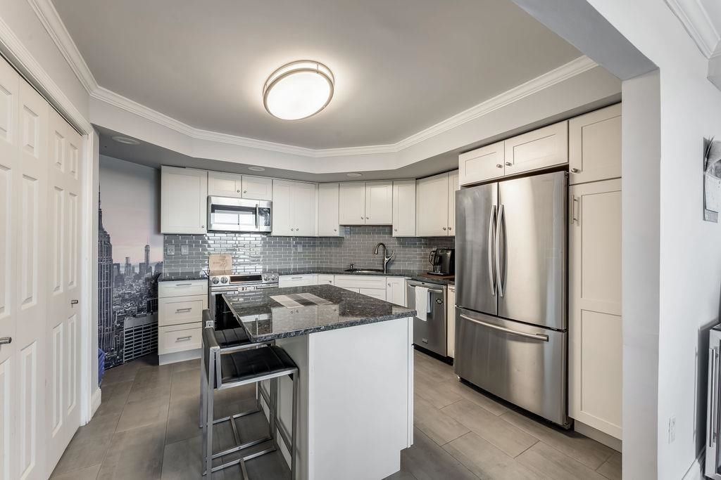 2110 HARMON COVE TOWER