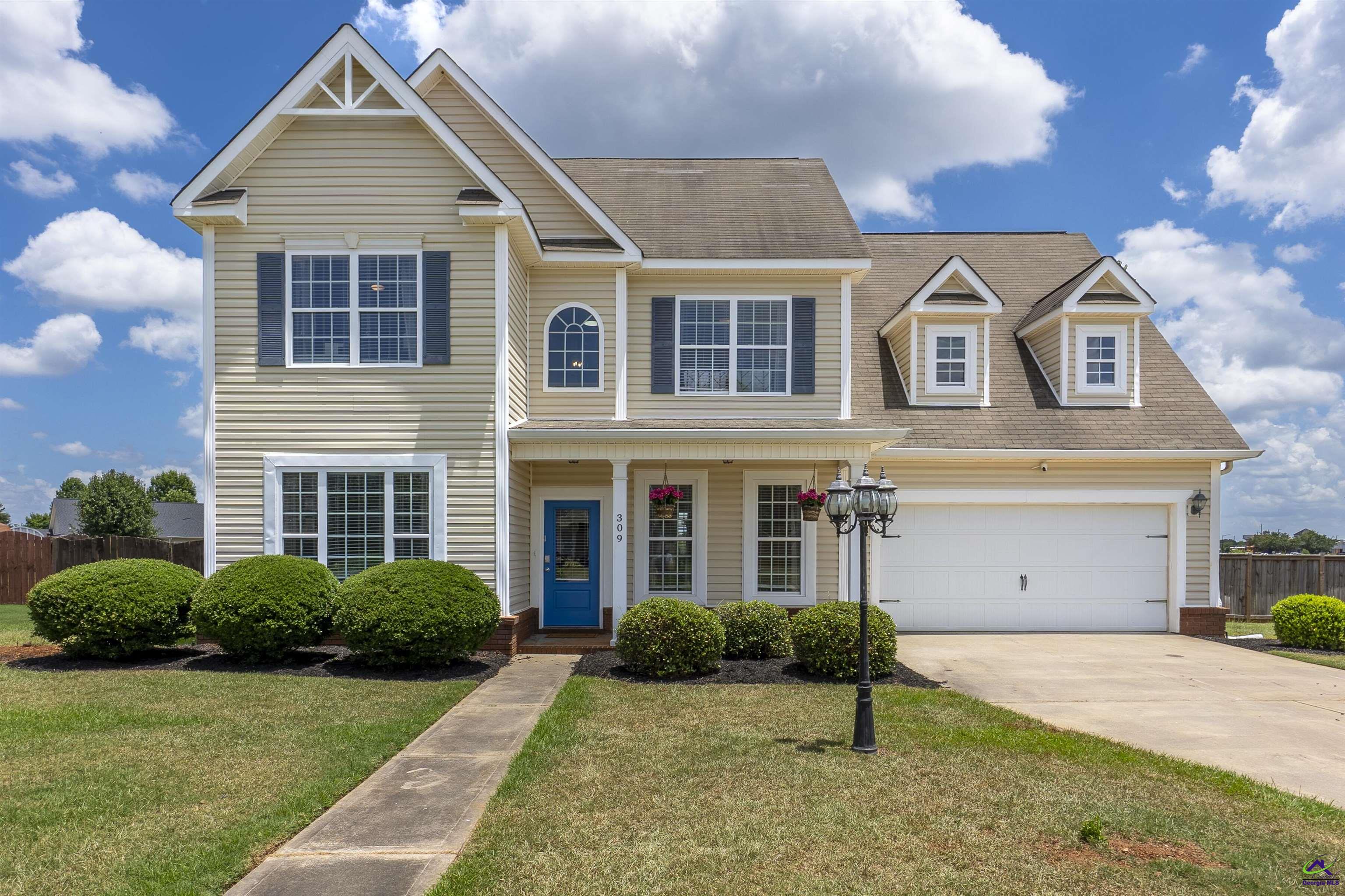 FULLY FURNISHED MONTHLY RENTAL!  Spacious 5BR Family Retreat | Sleeps 14 | Huge Private Yard + Garage!  Welcome to your perfect home-away-from-home! This large 5-bedroom, 2.5-bathroom retreat is ideal for families, groups, or anyone needing plenty of space and comfort. With 8 beds total, there's room for everyone to stretch out and relax.   Sleeping Arrangements:  Primary Bedroom: King Bed Bedroom 2: Queen Bed Bedroom 3: Queen Bed Bedroom 4: 3 Full Beds Bedroom 5: 2 Twin Beds  Bathrooms:  2 Full Bathrooms (one with separate walk-in shower and garden tub and one tub/shower combo) 1 Half Bathroom for added convenience   Kitchen & Dining: Enjoy a fully stocked kitchen with all cookware, utensils, and modern appliances—perfect for preparing group meals or family breakfasts. Whether you're making a simple snack or a full holiday spread, everything you need is right at your fingertips. The dining area offers plenty of seating for shared meals and game nights.  Garage & Parking: The home includes a 2-car garage and a spacious driveway, offering plenty of parking for your group.  Outdoor Space: Step outside to the huge privacy-fenced backyard—perfect for kids, pets, or just enjoying the peace and quiet with no back neighbors! Whether you’re grilling out, playing games, or enjoying your morning coffee in the fresh air, you’ll love the space and privacy this yard offers.  What You’ll Love: Fully stocked kitchen with cookware & utensils 2-car garage + ample driveway parking Smart TVs in every room & fast Wi-Fi Full-size washer and dryer Central heating and air conditioning Family-friendly layout with room to spread out