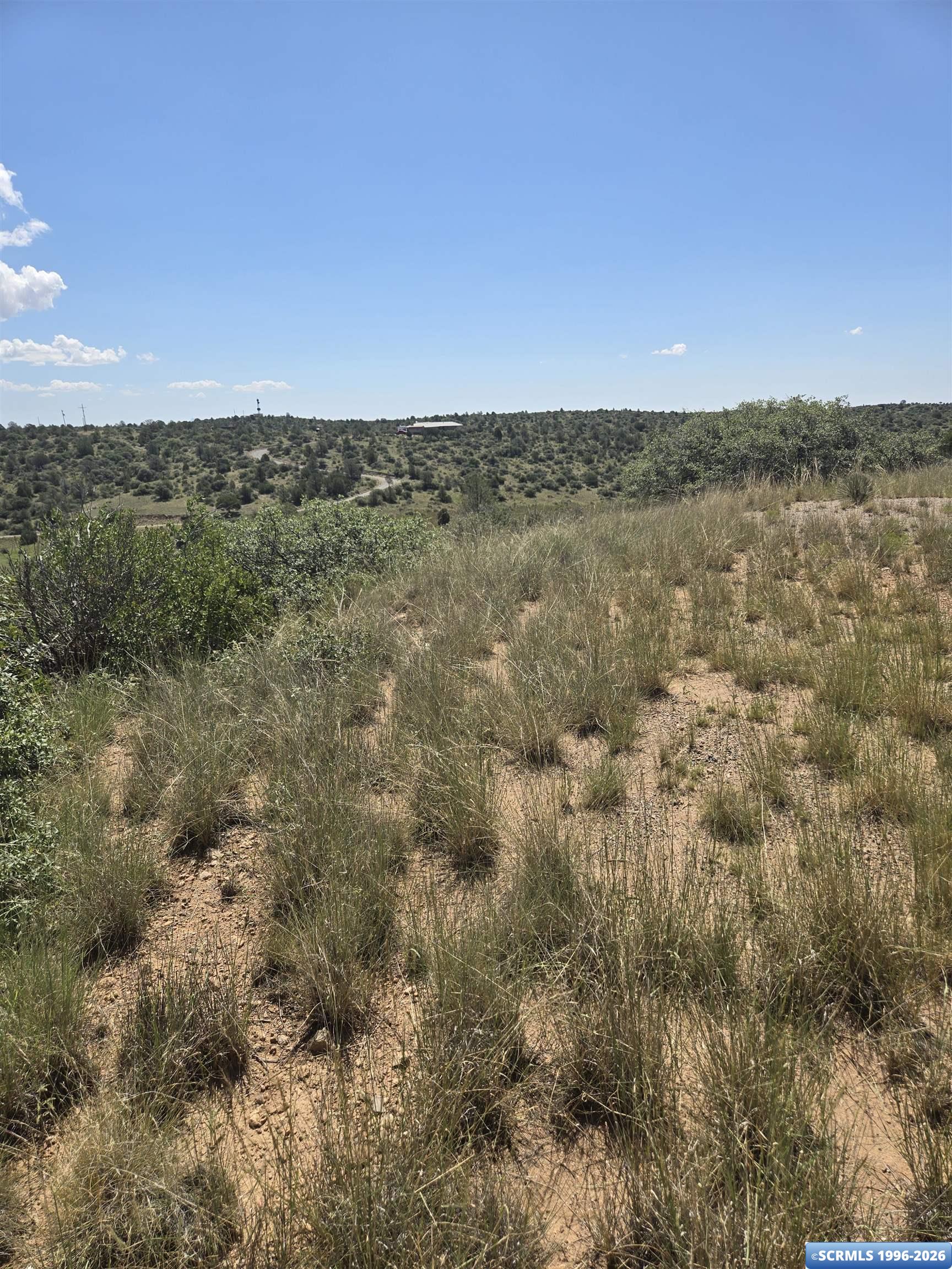 Beautiful ridge-top building site with breathtaking views in every direction and desirable southern exposure.