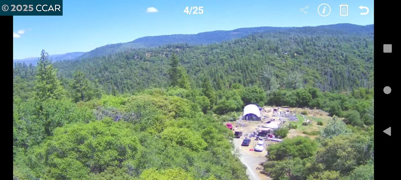 20 Acres in Oroville, JUST 2 minutes away from Stringtown boat ramp, and less than 8 miles away from Loafer Creek Boat Launch.  Access to the property is off of Stringtown Rd.  Operational well and septic on site.  Roughly an acre of open, flat, buildable space.  Build your dream home or quaint secluded campsite.  Included is a 25' x 50' greenhouse.  The options are ENDLESS!