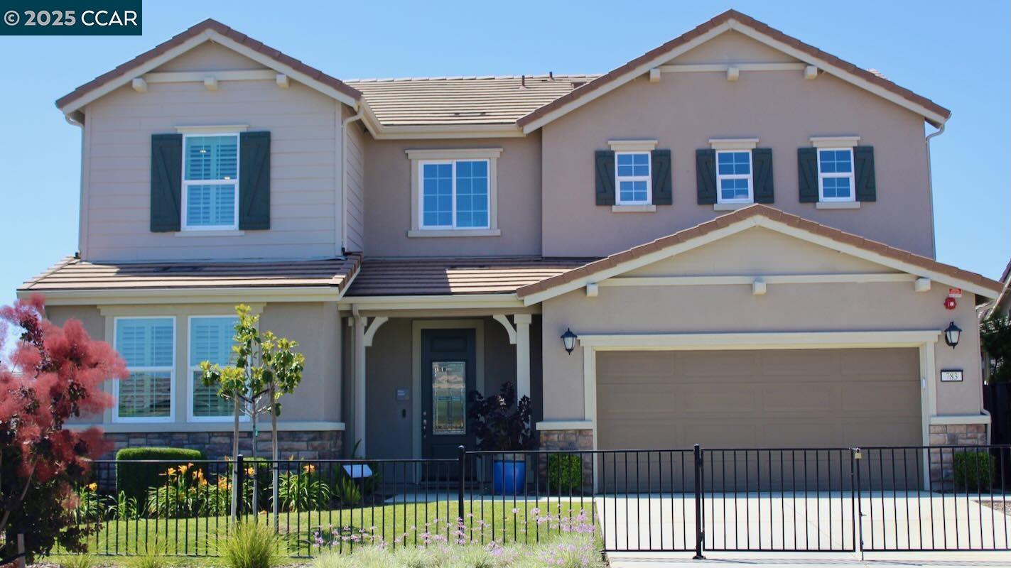 Brand new home, former model, move in ready, located in the desirable Wildhawk at Roberts Ranch community, surrounded by parks, scenic wetlands, and nature trails. Enjoy convenient access to I-80, Nut Tree Plaza, and Vacaville Premium Outlets for shopping, dining, and entertainment. Inside, the open floor plan features 9-ft. ceilings on the first floor, creating a bright and welcoming atmosphere. A downstairs bedroom offers a comfortable space for guests. The modern kitchen is a culinary centerpiece with an island, quartz countertops, and WhirlpoolÂ® and KitchenAid appliances. Upstairs, the primary bath impresses with marble countertops, a dual-sink vanity, walk-in shower, linen closet, and a spacious walk-in closet. Step outside to a covered back patio ideal for entertaining and everyday relaxation. Energy-efficient features include a smart thermostat, WaterSenseÂ® fixtures, Low-E windows, and a tankless water heater, solar included. Front and back yards professionally landscaped, large side yard could store boat or RV. Too many upgrades to list (see attachments) everything you see inside and out is included in the price. Use the builders lender and receive a credit for closing costs.