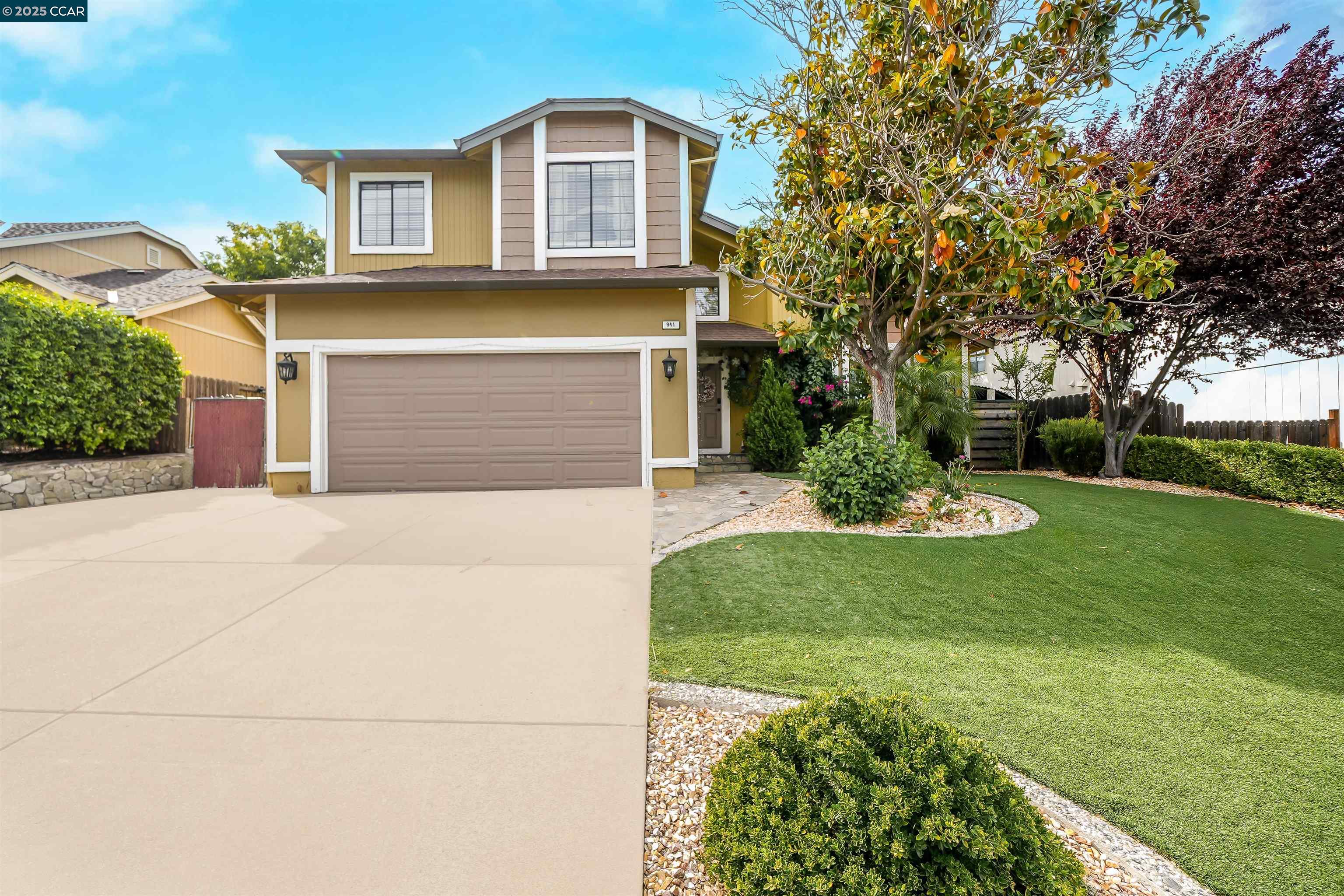 Welcome to this charming and spacious home featuring an open floor plan with two distinct living areas. At the entrance, you'll find a formal living room perfect for welcoming guests, while the cozy family room off the kitchen includes a warm fireplace — ideal for relaxing evenings.  The kitchen is well-equipped with granite countertops and stainless steel appliances, making it both functional and stylish for everyday cooking. Ceiling fans throughout the home provide added comfort.  Step outside to a large back patio, perfect for family gatherings, outdoor dining, or additional parking and storage.  Conveniently located near schools, parks, and shopping centers, this home offers the perfect blend of comfort, space, and style.  Don't miss this opportunity to make it yours!