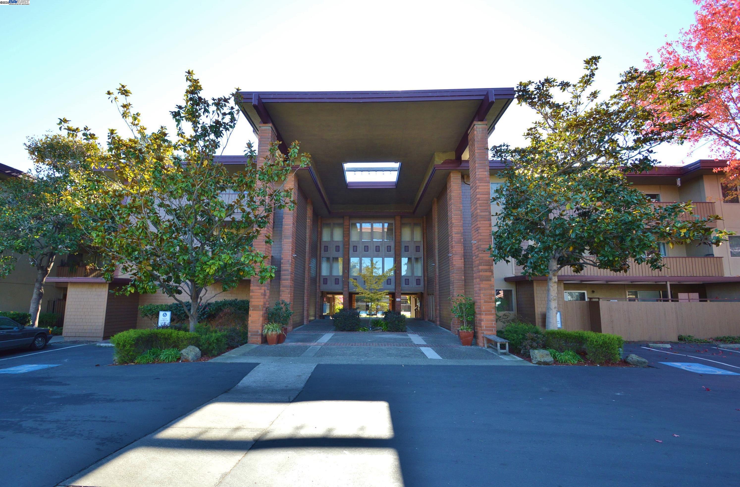 PRICE REDUCED!! Located at the end of Webster Street, with easy access to its vibrant dining and shopping options, Park Webster is a gated community of condominium homes. This ground floor unit boasts an updated kitchen, lots of new flooring, a spacious bedroom with two generous closets, and a living room/dining area space. A generous patio has a roomy storage closet, and the deeded parking space is located close to the unit. Beautiful grounds surround the community pool. Commute options such as AC Transit and the ferry are close by, as are Washington Park, Crown Beach, and breweries, restaurants and shopping at the Point. The farmers market is just a few blocks away. This is your opportunity for convenient modern home ownership in the heart of Alameda's West End.