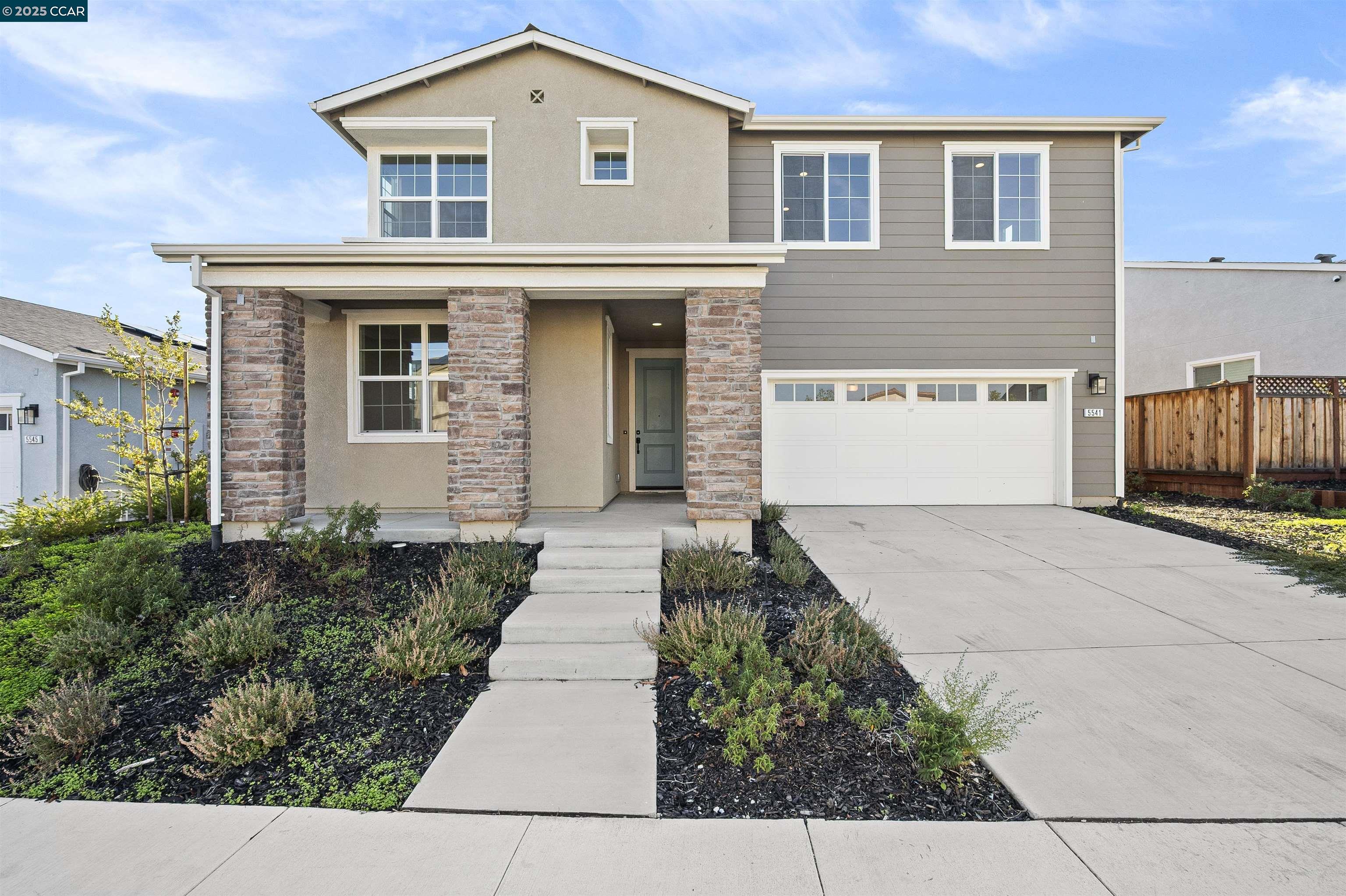 Welcome to luxury living at its finest in this expansive and upgraded Plan 5, the largest and most coveted floor plan in The Hills Park Ridge.Featuring 5 spacious bedrooms,4 full bathrooms, and a versatile loft, this home offers the perfect blend of comfort, style, and functionality. Step into a bright and airy open-concept layout with soaring vaulted ceilings, energy efficient sun-filled windows, recessed LED lighting, and sleek plank flooring throughout the main areas.The chef's kitchen is a showstopper with stone countertops, stainless steel appliances, a large island with breakfast bar, and a walk-in pantry.The main level includes two bedrooms and two full bathrooms. Upstairs, retreat to the luxurious primary suite with an ample walk-in closet, dual-sink vanity, soaking tub,and separate shower. Plush carpeting adds warmth and comfort to the upper level, which also includes a laundry room and an open loft overlooking the living room below. Enjoy California outdoor living in the low-maintenance backyard, beautifully designed with pavers and artificial turf-perfect for entertaining or relaxing year-round. Located just steps from Julpun park, featuring sports fields, a dog park, and BBQ areas.