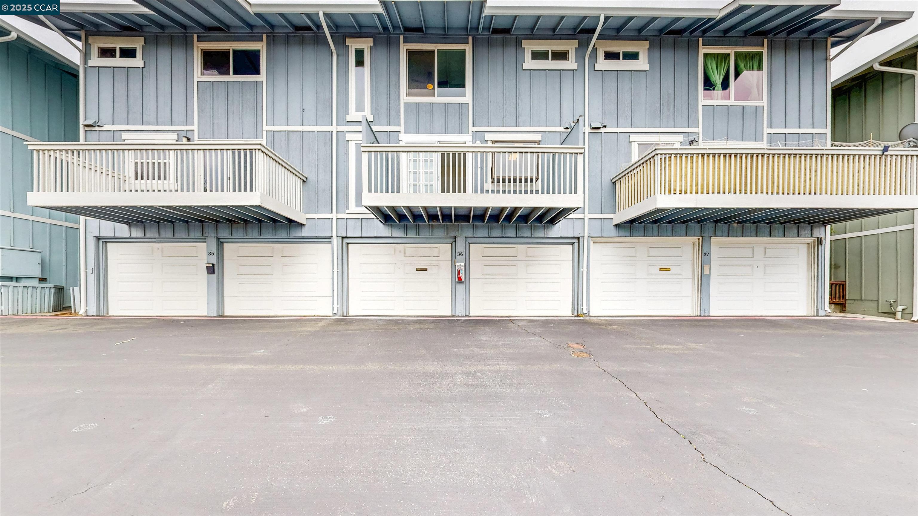 Townhome style living comes with water and scenic views of Benicia while you are sipping on your coffee from your balcony deck and bedroom. Beautifully updated with a new kitchen with new white counter tops and cabinets, a deep stainless steel sink, and new stove and hood vent. Both bathrooms are also updated with new cabinets and lighting fixtures. New paint through out and new carpets installed. You have your own in house laundry and a front patio as well. This unit comes with an attached garage with plenty of storage space. Comes with central heat and AC. A must see to appreciate especially the views.