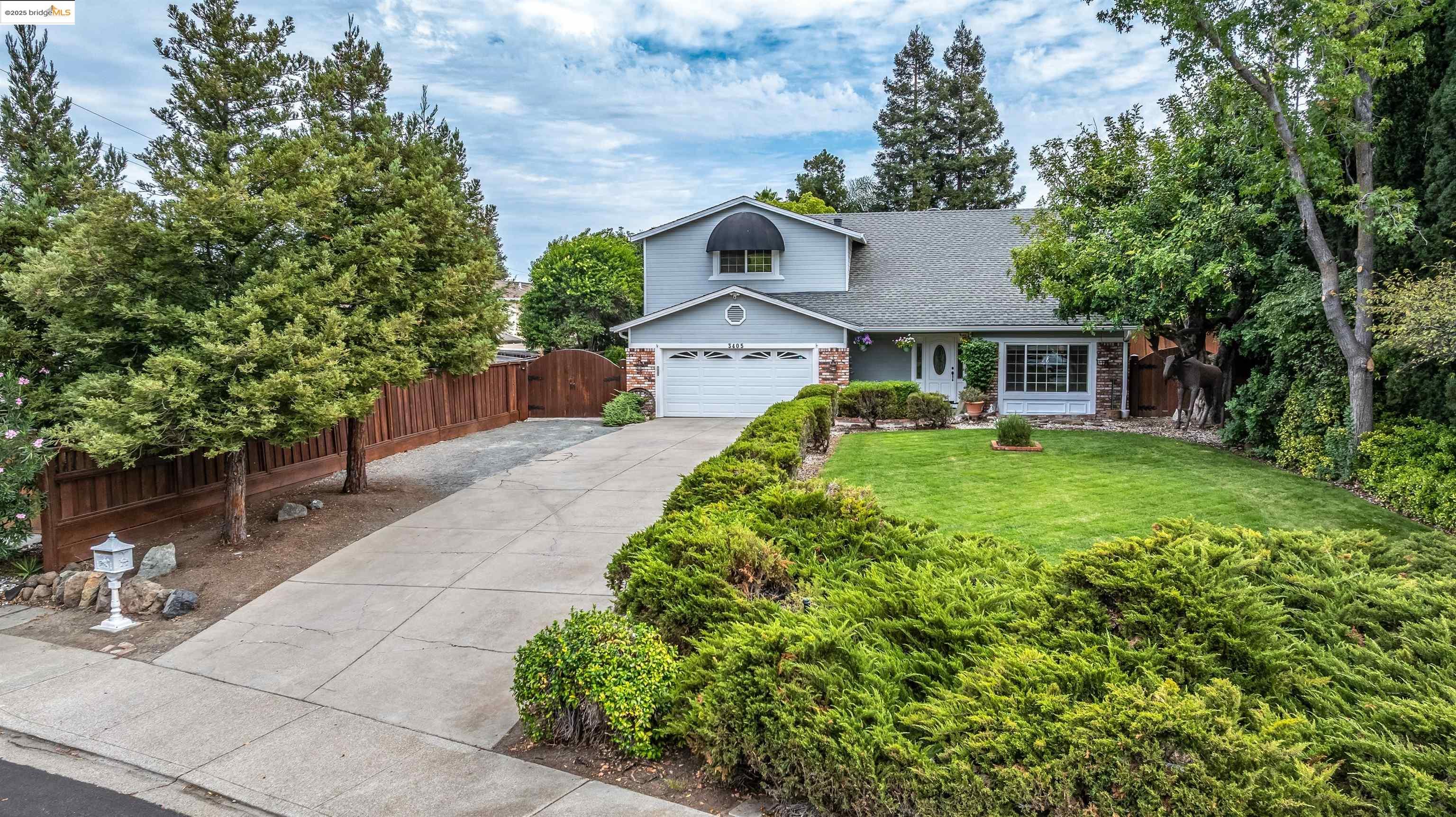 Where history and charm come together:  This well maintained 1,863 sq ft. 4 bedroom 2.5 bath home shows the pride of ownership. Lots of add on bells and whistles here. Sitting back off the road,  Pull into the dbl wide  driveway and you'll notice the upstairs sunshade from the old Campanile theatre in downtown Antioch.  Enter through the front door into a large foyer with an ascending spiral staircase.  To the right is an office/ den with plenty of natural light. Family room / Kitchen combo offers a nice flow to the downstairs. Family room is wired for surround sound has has multiple can lights on dimmers. Kitchen features a stainless steel, Zline gas burner stove with electric oven, beautiful custom slate floors & real stained glass light coveri above the sink. Under cabinet counter lights and 9 flush mount LED lights on dimmers on the ceiling. Indoor laundry next to the 1/2 bath with nostalgic old style brass pull chain toilet & custom made handle, complimented with custom sink handles.  4 beds and 2 baths upstairs. End bedroom with additional large walk-in closet and storage area.  Middle bathroom made with a one of a kind custom antique buffet with original felt lined drawers.  Primary bedroom with cedar walled vanity area, walk in closet. CLEAR SEC 1 To many upgrades to list