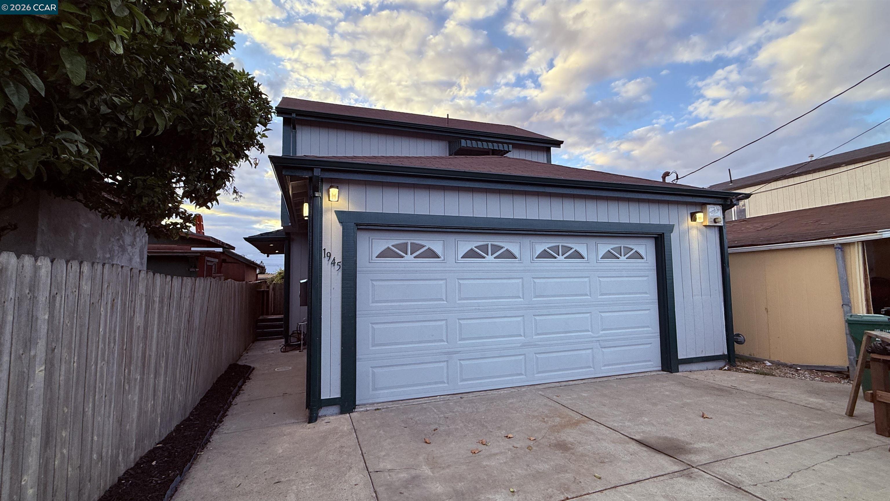 Welcome to 1945 21st Street. A 3 bd & 2 bath home with just over 1,000 sq. ft. of living space is located in the heart of San Pablo. Commuting is a breeze with easy access to major Bay Area freeways, parks, shopping, dining, and schools. Sewer lateral compliant as of 6/25, this move-in ready property is the perfect opportunity for first-time homebuyers or those seeking versatility in their living arrangements. Step inside to find high ceilings and an open, airy layout filled with natural light. With fresh interior paint throughout, brand-new carpet upstairs, hardwood LVP flooring and new blinds help create a clean and modern look. The functional kitchen and dining area open to a tiled two-car garage with laundry hook-ups, built-in storage, and space ideal for parking, a home gym, or a workshop.The primary suite on the main level offers privacy and deck access, while two additional upstairs bedrooms provide flexibility for guests, children, or a home office. Enjoy dining or morning coffee on the expansive deck overlooking a shed and private yard—perfect for entertaining, gardening, or your four-legged friends. Staging has been removed and the property is vacant. Back on market, buyer's couldn't perform. Don't snooze and miss out on this fantastic property!    OPEN HOUSE SAT. 1-4PM