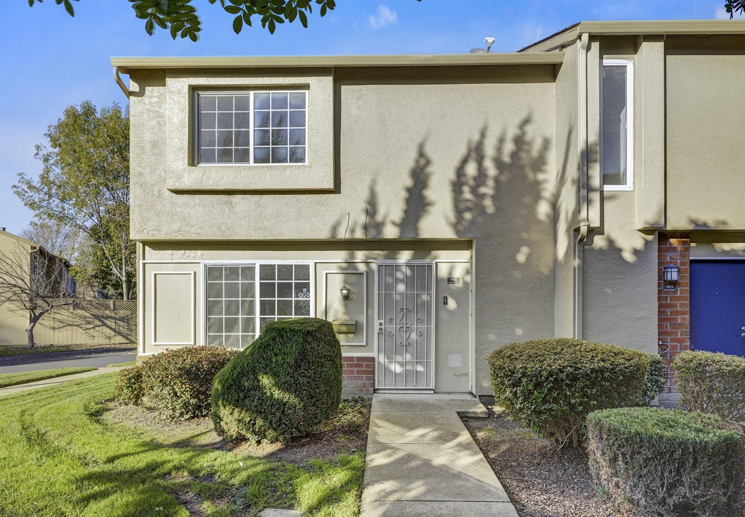 Step into your beautiful new home, perfectly prepared for you to move right in. The modern kitchen delights with granite counters, cabinets, and appliances. Relax in the living area with fresh carpet and modern flooring. Retreat to the master bedroom, complete with a generously sized walk-in closet. This home offers a unique 3 bed and 2.5 bath floor plan not found elsewhere in this neighborhoods, ideal for investors or a multi-family living situation. As an end unit, enjoy added privacy. Ample space for parking in this community. The exceptional location let you walk to shopping and simplifies your commute—Facebook is only 12 miles away, with easy and fast access to the freeway and Dumbarton Bridge.