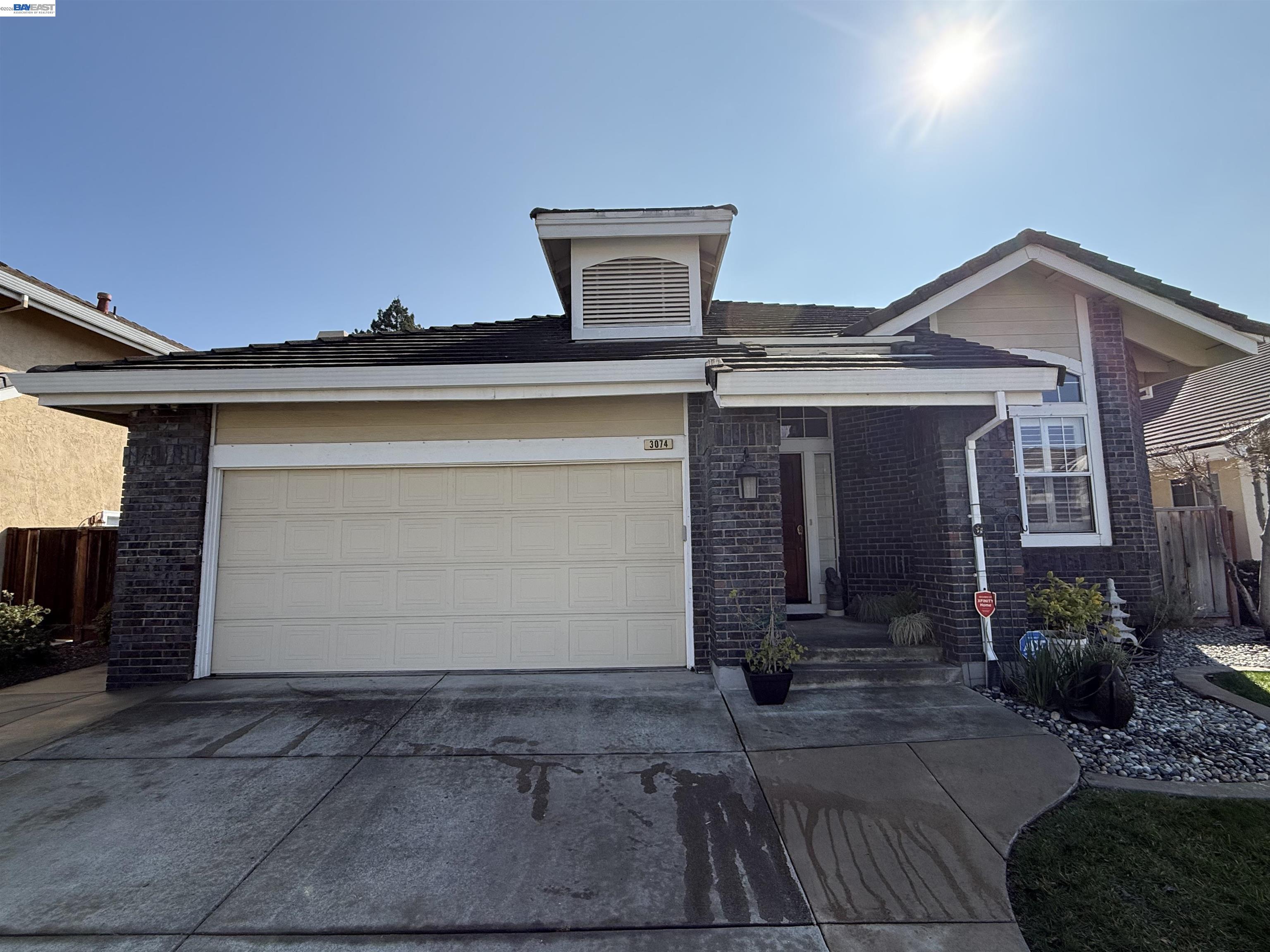 Discover this beautifully maintained, North facing and rarely available single-story home nestled in one of Pleasanton’s most desirable neighborhoods—without the hassle of an HOA. Welcome to 3074 Boardwalk St., where refined single-level living meets the best of Pleasanton’s lifestyle. This spacious 3-bedroom, 2-bathroom residence boasts a sun-filled open-concept layout with vaulted ceilings in the living room, family room, and bedrooms, creating a bright and inviting atmosphere throughout. The kitchen offers generous counter space and seamlessly flows into the family room, making it an ideal spot for entertaining. The primary suite provides a true retreat with a newly remodeled bathroom with a soaking tub and walk-in closet.  Outdoor living is redefined with a low-maintenance yard and a large 10-person spa, offering peaceful relaxation and effortless enjoyment.  Two car garage is EV ready with a 240V outlet and a 16x16 fully finished storage loft.  Conveniently located near top-rated Pleasanton schools, walkable parks and trails, and easy access to I-580, I-680, BART, restaurants, and shopping, this home offers a perfect blend of comfort and convenience.