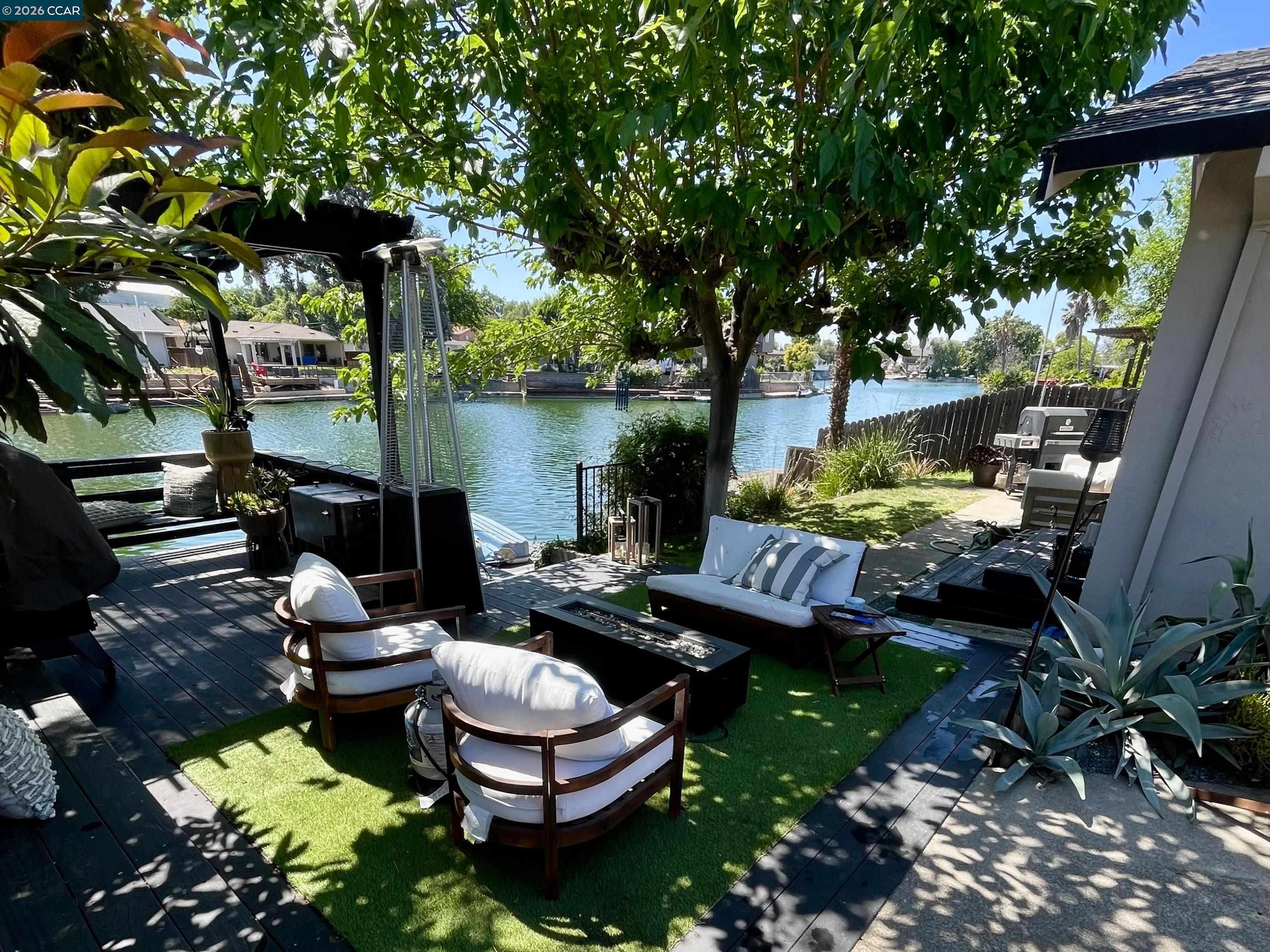 Welcome to 120 E. Lake Drive — a refined retreat in the desirable Lake Alhambra community.  Thoughtfully reimagined with extensive system upgrades, including a fully replaced plumbing system (2022), new HVAC, updated electrical, new garage door and opener, new interior doors, and newly replaced exterior decking (2024), this residence offers elevated comfort with uncompromising peace of mind.  The flowing floor plan connects living, dining, and family spaces with effortless sophistication, ideal for both intimate evenings and curated gatherings. Outdoors, a private backyard sanctuary awaits, complete with a hot tub and fire features designed for year-round enjoyment.  A rare blend of lifestyle, quality, and quiet confidence — ready to be experienced.