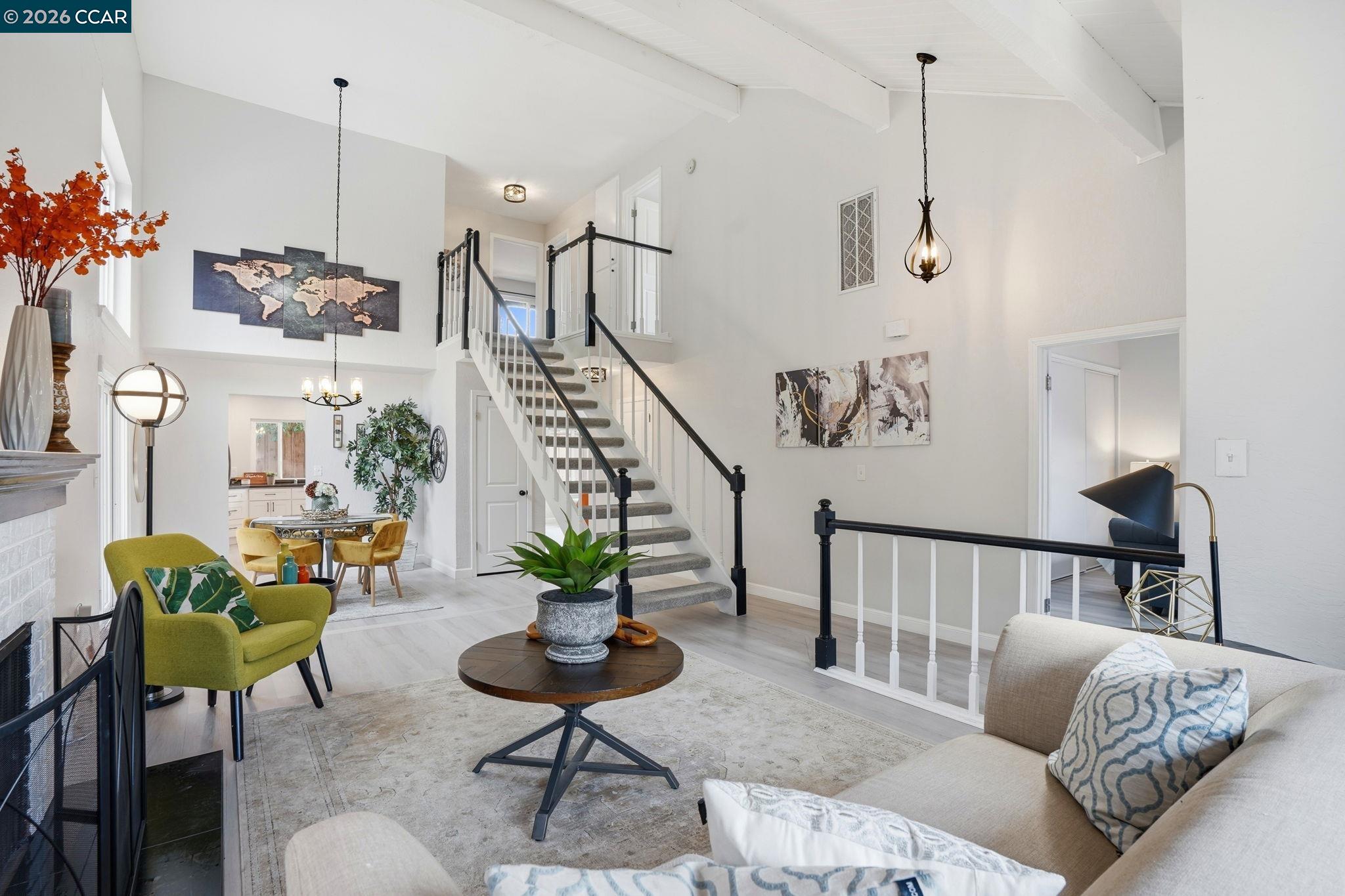 Nestled at the corner of a serene cul-de-sac, this stunning two-story home offers breathtaking Mt. Diablo views, a thoughtfully designed open floor plan, and the perfect blend of indoor-outdoor living. Extensively updated in 2022, this move-in-ready gem exudes style and comfort at every turn. Step inside to discover luxurious vinyl flooring and a layout bathed in natural light, with vaulted ceilings in the living room, dining area, and primary suite creating a bright, airy atmosphere.The light-filled kitchen impresses with sleek countertops, ample cabinetry, a pantry, and newer stainless steel appliances, including a breakfast bar. The adjacent family room flows effortlessly to multiple outdoor spaces. The main bathroom is an elegant spa-like retreat with a walk-in shower featuring a rainfall showerhead. Each bedroom offers spacious full-size closets, while the fourth bedroom boasts a wall-to-wall closet. Outside, a private oasis awaits with a spacious deck and gas-heated pool and hot tub. Two-car garage with finished attic storage and an extra exterior compact car parking space. Located just a short stroll from picturesque hiking trails, lush parks, downtown Clayton, and shopping amenities. No HOA. This home truly offers a lifestyle of comfort, convenience, and charm.