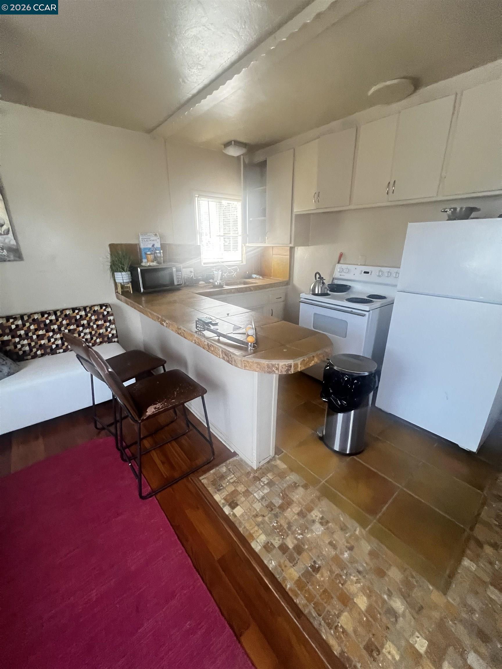 Detail Gallery Image 13 of 25 For 1161 64th St, Oakland,  CA 94608 - 5 Beds | 2/1 Baths