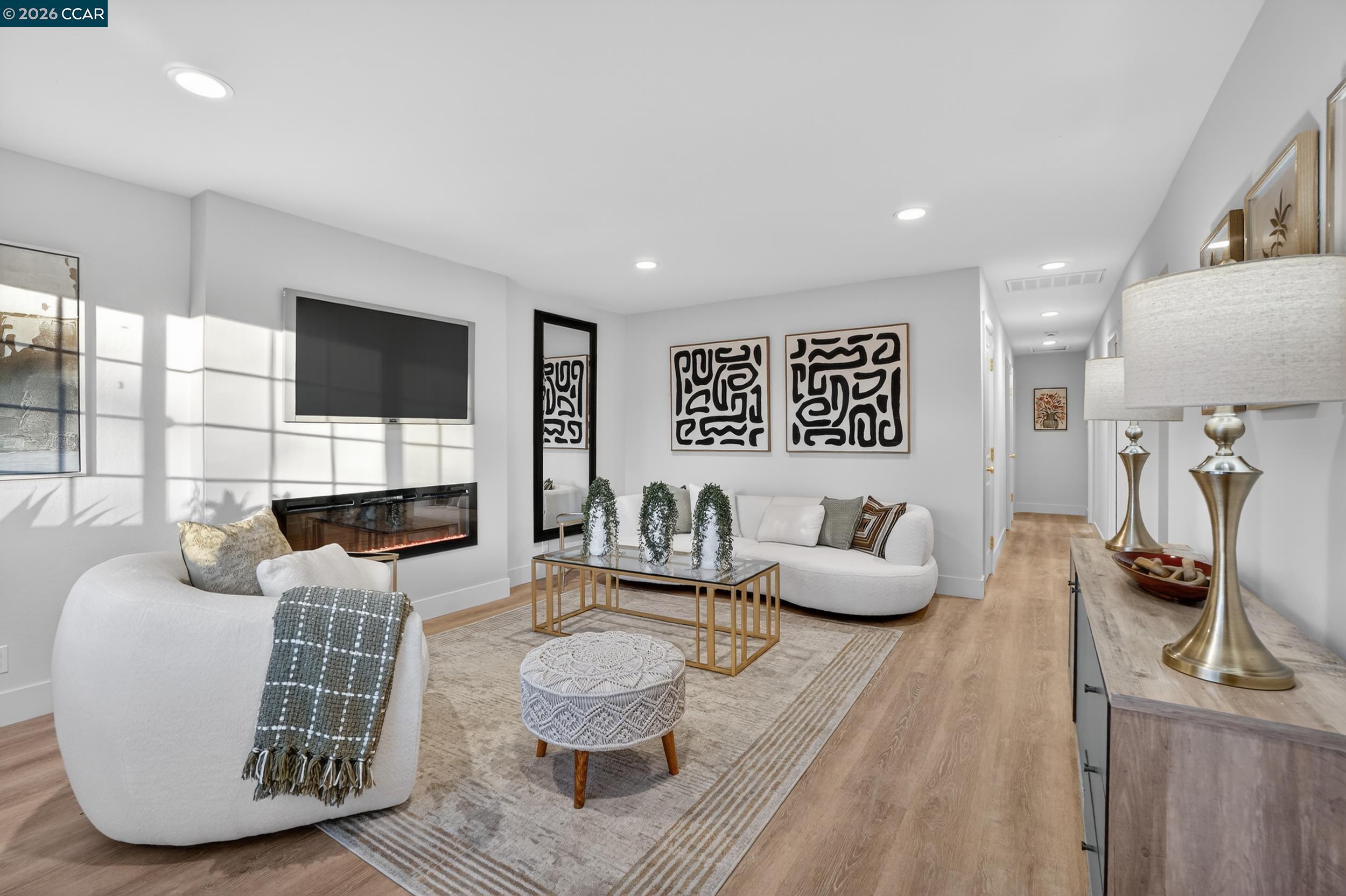 Stunning single-family home on a quaint dead-end street with a charming and inviting location!Thoughtfully designed drought-tolerant landscaping welcomes you into this updated home, where natural light fills every space. Luxury vinyl plank flooring, recessed LED lighting, designer fixtures, and expansive windows create a modern, airy feel. The updated layout includes a gourmet kitchen with quartz countertops, custom backsplash, gas range, fridge, microwave, dishwasher, eat-in nook, and ample pantry space. Separate living and family rooms offer versatile spaces, with the living room showcasing a show-stopping fireplace wall. Spacious, updated bathrooms and abundant storage throughout. Enjoy a park-like backyard perfect for relaxing or entertaining. Zoned for great schools (buyer to verify) and right around the corner from Silverwood Elementary, parks, shopping, and restaurants.