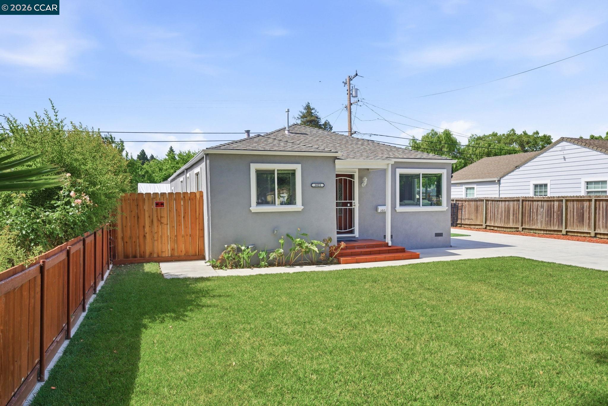 Step into style and comfort in this beautifully remodeled Vallejo charmer! This move-in-ready 3-bedroom, 2-bath home offers approximately 1,392 square feet of thoughtfully updated living space on a 5,662 square foot lot. Blending modern upgrades with timeless appeal, this inviting residence features two spacious living areas, providing flexibility for today's lifestyle. One of the living rooms can easily be converted into a 4th bedroom, home office, or guest space to suit your needs.  The heart of the home is the stunning remodeled kitchen, showcasing sleek cabinetry, quartz countertops, white appliances, and contemporary finishes designed for both functionality and style. Enjoy updated flooring throughout, beautifully renovated bathrooms, newer interior and exterior paint, and a newer roof, offering peace of mind for years to come.  Outside, you'll find abundant parking options including a detached garage, extended driveway, and convenient RV parking—perfect for vehicles, recreational toys, or additional storage needs. The spacious lot offers room to relax, entertain, garden, or create your own outdoor retreat.  Ideally located in the heart of Vallejo, this home provides easy access to shopping, dining, parks, schools, and major commuter routes including I-80. Whether you're a first-time buyer, growing household, or investor seeking a turnkey property, this exceptional home offers comfort, versatility, and value in one attractive package.  Don't miss the opportunity to make this beautifully updated Vallejo home your own!