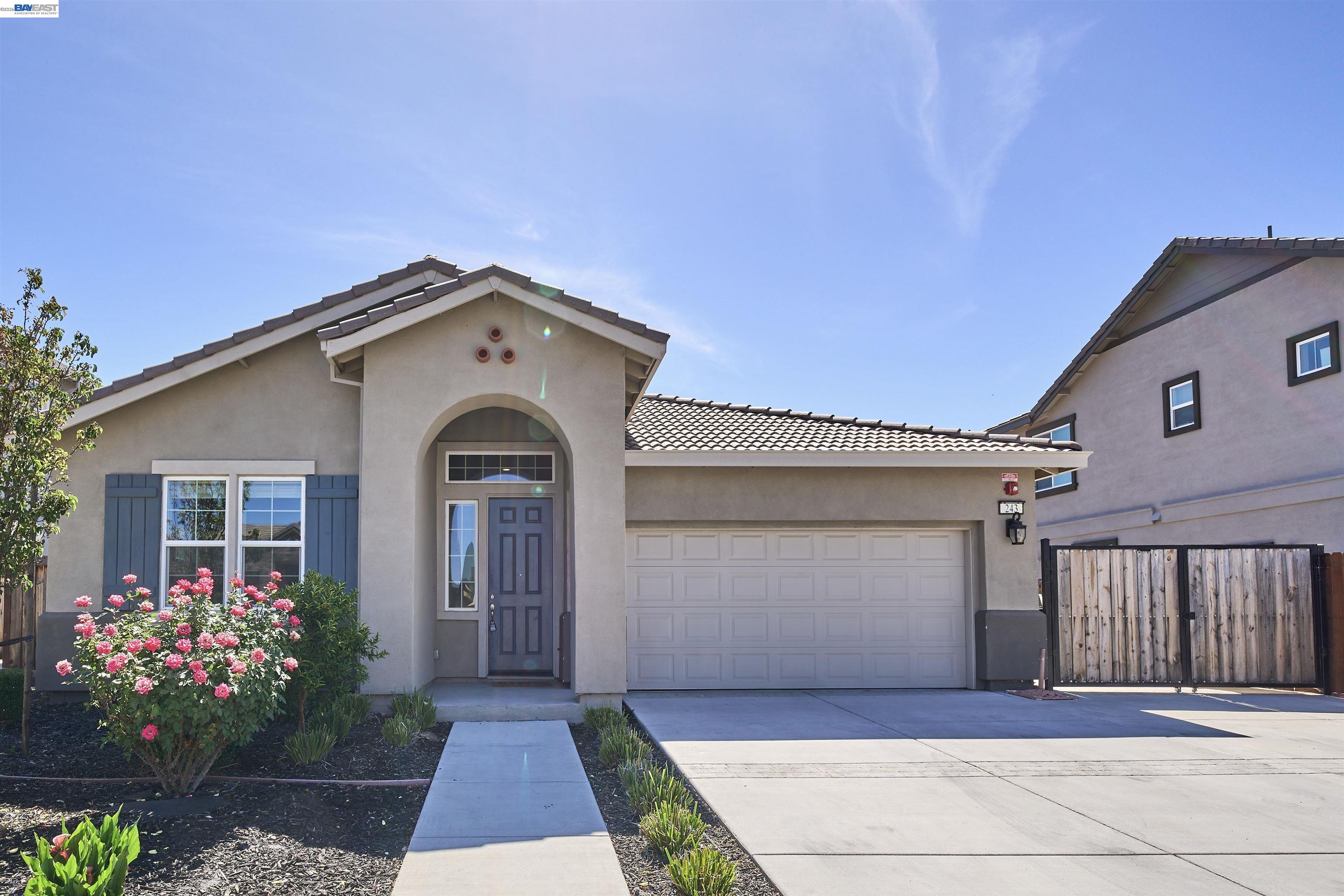 Welcome to this beautifully upgraded 2021-built home by Discovery Homes, located in one of Vacaville’s most desirable master-planned communities.  This 4-bedroom, 2-bath, 1,815 sq ft home features soaring ceilings and a bright, open-concept living and family room with an electric fireplace. The chef’s kitchen showcases quartz countertops, a center island with bar seating, abundant cabinetry, and stainless steel appliances.  Step outside to a low-maintenance backyard complete with a custom-built gazebo — your own private retreat for relaxing and entertaining year-round. The property also offers dedicated RV parking, providing added convenience for recreational vehicles, trailers, or extra storage needs. The finished 2-car garage features upgraded flooring, adding a clean and polished touch.  Located near schools, Lagoon Valley Park, and surrounding open space, residents can enjoy miles of hiking and biking trails, outdoor recreation. Andrews Park’s popular Creekwalk and the iconic Nut Tree Plaza offer shopping, dining, and entertainment just minutes from home.  Vacaville is one of Northern California’s hidden gems, home to a growing biotechnology and life sciences hub with major employers including Lonza and Thermo Fisher Scientific, as well as the renowned Vacaville Premium Outlets. The famous Jelly Belly Factory in neighboring Fairfield is just a short drive away.  Convenient access to UC Davis, nearby healthcare facilities, and a low HOA of just $27 per month add to the home’s exceptional value. With quick access to I-80 and Hwy 505, commuting to the Bay Area or Sacramento is easy. Don’t miss this opportunity to own in one of Vacaville’s most sought-after communities.