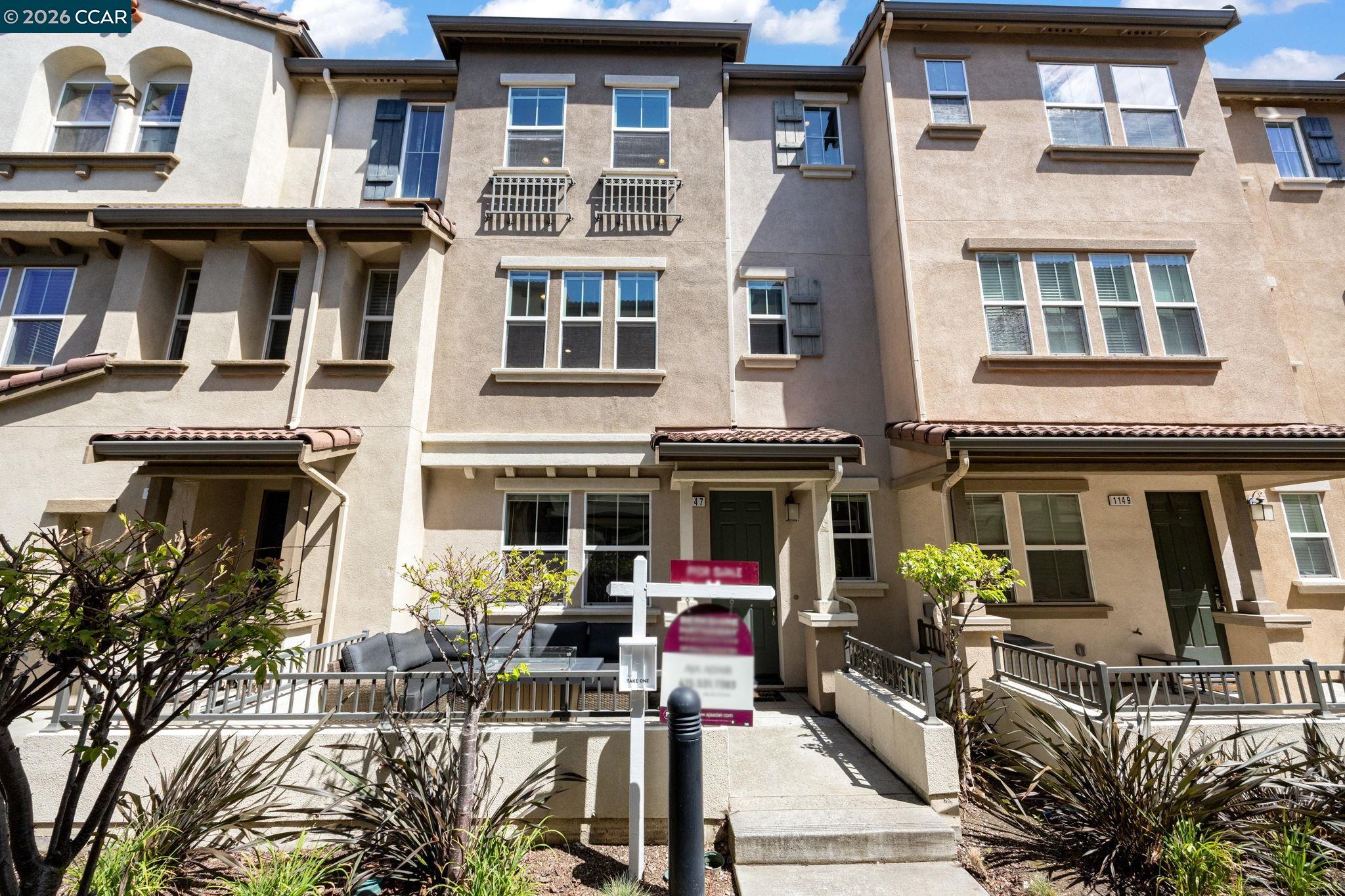 Beautifully updated townhome-style condo in Hayward's desirable Burbank neighborhood with bright open living, engineered wood flooring, a remodeled kitchen, bonus room, and attached 2-car garage. This 3-bedroom, 2.5-bath home offers 1,704 sq ft of open, functional space with high ceilings, recessed lighting, dual-pane windows, stainless steel appliances, walk-in closets, a laundry room, and a first-level bonus room ideal for a den, media room, office, or flex space. The kitchen was remodeled in 2023 with new countertops, backsplash, sink, microwave, range, and an extended island with seating, plus a walk-in pantry and generous cabinet storage. Seller updates continue with a new washing machine in 2024, new engineered wood flooring on the ground and first levels in 2025, new water heater in 2025, and new dishwasher in 2025. In 2026, the stair carpet was replaced and the baseboards and trim were repainted. Community amenities include parks, BBQ areas, playgrounds, and bocce ball courts. Convenient to Downtown Hayward, shopping, dining, the library, BART, Amtrak, and 880, 580, and 92. Low HOA of $265/month.