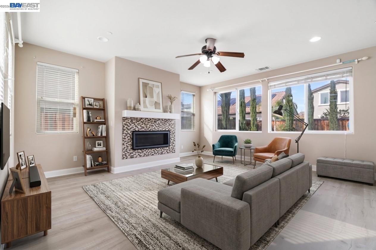 Welcome to 967 Dainty Avenue, an expansive and beautifully updated 3,716 sq. ft. contemporary sanctuary offering unparalleled space, modern efficiency, and the perfect layout for multigenerational living or flexible work-from-home lifestyles. Boasting up to 6 distinct bedroom spaces and 4 full bathrooms, this turnkey residence delivers luxury and functionality with zero HOA restrictions.    The Main Level: Ultimate Versatility  Step past the inviting facade into a bright, grand layout featuring pristine engineered wood flooring. The main floor is a multi-generational dream, offering a private bedroom and a full bathroom perfect for guests or extended family. A dedicated grand home office/bonus room handles remote work seamlessly, while a versatile front flex room stands ready as a formal parlor or play area. At the heart of the home, a romantic fireplace anchors the living area, flowing effortlessly into a sunlit breakfast nook and a beautifully remodeled open-concept chef's kitchen. Love to entertain? The formal dining room opens directly onto a private, charming courtyard retreat for seamless indoor-outdoor hosting.    The Upper Level: Grand Scale & Comfort  Follow the updated staircase to a massive, highly efficient loft area. The second floor includes two spacious secondary bedrooms sharing a pristine full bath, a dedicated walk-in laundry room, and a rare secondary junior suite complete with its own private full bathroom and walk-in closet. The crowning jewel is the sprawling primary retreat—an oversized sanctuary designed for ultimate comfort, boasting a spa-like ensuite bath and a massive walk-in closet.    Outdoor Living & Efficiency  The low-maintenance 7,280 sq. ft. lot is meticulously tailored for relaxation, featuring an intimate backyard setup highlighted by a soothing heated spa. Upgraded with modern infrastructure, the home includes central A/C backed by a whole-house fan, an electric vehicle (EV) charging station in the 2-car garage, and an energy-saving solar power setup. Located just minutes from top-rated Brentwood schools, neighborhood parks, shopping centers, and major commuter corridors. This rare blend of massive square footage and modern amenities is priced to move immediately  ***Some photos have been virtually staged to illustrate the potential use of the home's spaces.Furniture and decor are for illustrative purposes only and are not included in the sale.***