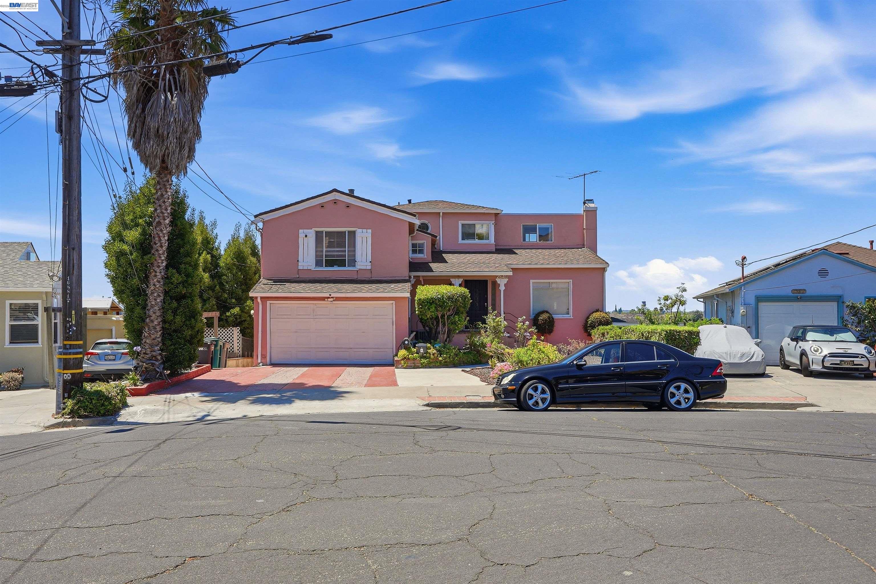 Welcome to this charming fully updated 3-bedroom, 2-bathroom home in the Oakland foothills with breathtaking views of the bay, offering the perfect blend of comfort, style, and elegance.  Filled with natural light, the main level has an inviting floor plan that features spacious living areas with newly installed hardwood and natural stone flooring, quartz countertops, new appliances, cherry wood cabinets, stylish vanities and modern finishes.  On the second level, you will find three generous sized bedrooms and ample storage space.  The home has a newly installed roof, separate A/C units on both levels, and a new tankless water heater.  Step outside to the back yard to an enormous deck with exceptional views — ideal for unforgettable family events and entertaining. **ADDITIONAL LIVING AREA with its own separate entrance - a fully updated living space, 2-bedroom, 1 bath equipped with a fireplace and kitchenette.  Conveniently located just minutes from the Oakland Zoo, parks, shopping, dining, schools, and freeways.  This Oakland gem combines neighborhood charm with easy access to everything the Bay Area has to offer!