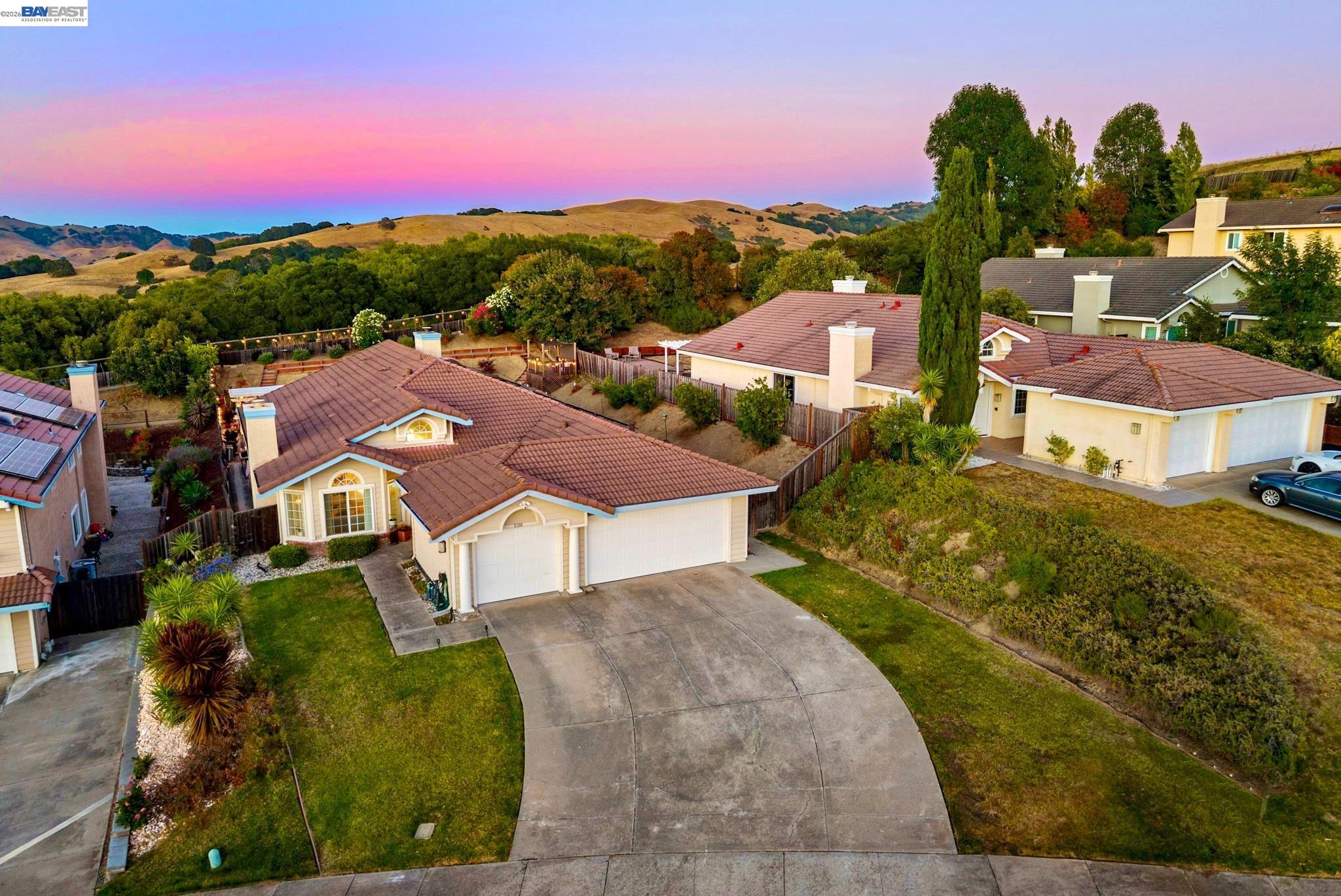 **COMING SOON!** Perched in the highly desirable Carriage Hills South community on the Richmond/El Sobrante border, this extensively upgraded single-story home offers PANORAMIC HILLSIDE VIEWS, exceptional privacy with no rear neighbors, and a truly turnkey lifestyle. With an expansive backyard and countless high-end improvements, this is a rare opportunity to own one of the neighborhood's standout properties.  Inside, you'll find a bright, thoughtfully updated interior featuring new engineered hardwood flooring, recessed lighting throughout, modern designer fixtures, beautifully remodeled bathrooms, and a stunning remodeled kitchen complete with new appliances. A smart thermostat adds everyday comfort and convenience, while every enhancement has been carefully selected to elevate both style and functionality.  Designed with today's lifestyle in mind, the home also features an upgraded 200-amp electrical panel, paid-off solar, a Tesla Powerwall, and a Tesla EV charger... providing energy efficiency, backup power, and EV-ready convenience.  The backyard is where this home truly shines. Entertain with ease in the custom-built outdoor kitchen, unwind beneath the pergola, or enjoy your morning coffee and evening sunsets from the elevated viewing deck overlooking the rolling hills. New stamped concrete, a beautifully designed walking path with hillside steps, mature fruit trees, and a drip irrigation system create a private outdoor retreat that is both functional and unforgettable.  Ideally located just minutes from parks, shopping, dining, BART, and major commuter routes, residents also enjoy access to the Carriage Hills South community pool and clubhouse. This exceptional home offers the perfect combination of luxury upgrades, energy-efficient living, SPECTACULAR views, and peaceful privacy in one of the area's most sought-after hillside neighborhoods. This is not a MUST SEE, this is a MUST HAVE!