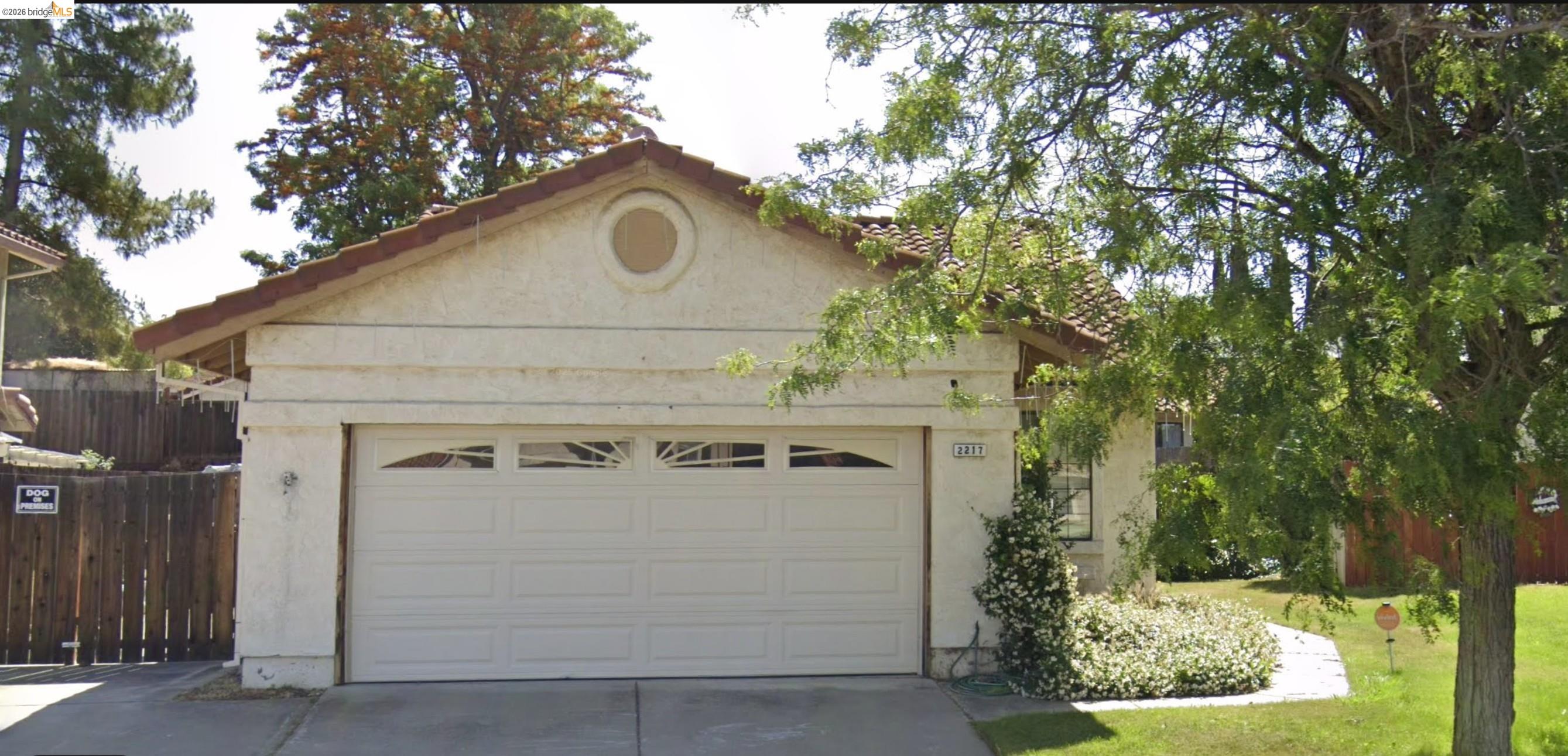 Opportunity Knocks in Antioch — Bring Your Vision and Build Instant Equity  This home has the bones buyers dream about and the price tag that makes the math work. This a solid stucco home with a tile roof, vaulted ceilings, and those gorgeous architectural alcoves that give this floor plan real character - the kind of details builders don't include anymore.  The mechanicals are in good shape, HVAC was updated in 2016 and the master bathroom has already seen some love. Both bathrooms feature new vinyl plank flooring, and the subfloor throughout the main living areas is prepped and ready for your flooring of choice. Whether you're envisioning LVP throughout or a mix of carpet and hard surface, the canvas is clean.  The kitchen layout works, it just needs your personal touch on cabinets, countertops and appliances to really shine. The front yard presents well with lawn and extended driveway. The backyard offers RV/Boat parking, a retaining wall and usable space with potential to create an outdoor living area you'll enjoy.  This is the right home for a buyer who understands that cosmetic work equals equity and wants to be the one who gets the reward for it. Priced to reflect the condition and the opportunity. Homes with this much upside at this price point don't last long.  Come see what a little vision can do.