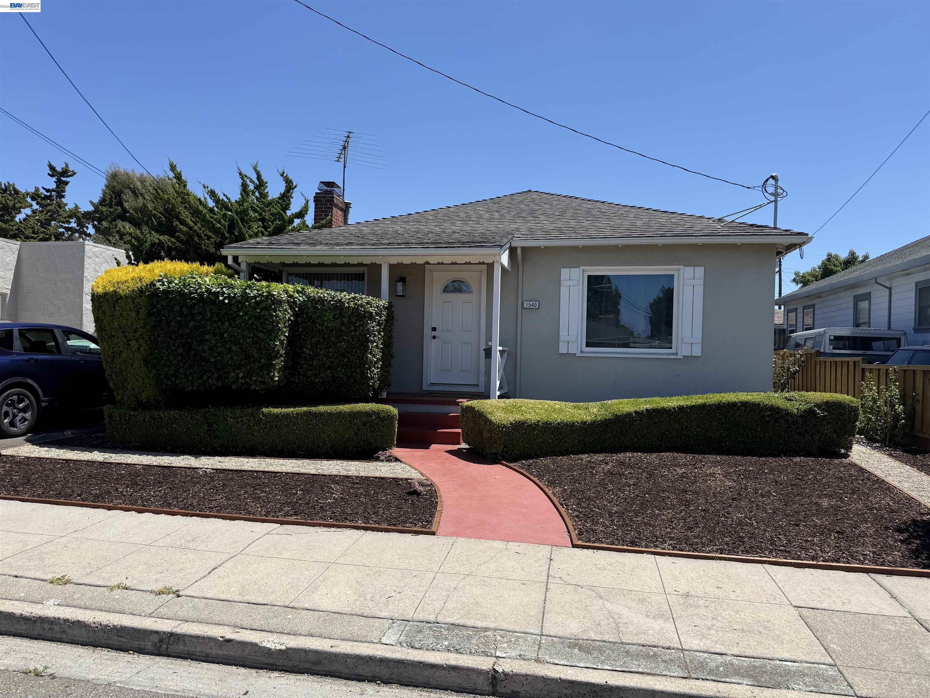 This charming Hayward home offers 2 bedrooms, 1 bathroom, and 942± square feet of thoughtfully updated living space on a generous 5,500± square foot lot, blending modern upgrades with everyday comfort in a convenient location. From the moment you arrive, you'll appreciate the inviting curb appeal and welcoming atmosphere. Step inside to discover a bright, functional floor plan featuring updated luxury vinyl plank flooring throughout, creating a clean, modern look with durability for everyday living. Large windows fill the home with natural light, creating warm and inviting living spaces perfect for relaxing or entertaining. The spacious living room flows seamlessly into the dining area and kitchen, offering an ideal layout for everyday living. The kitchen features ample cabinetry, generous counter space, and a functional design for preparing meals and gathering with family and friends. Recent improvements include updated electrical, providing added value and peace of mind. An added bonus is the wall-mounted mini-split heating and air conditioning system in each room, allowing for individualized climate control, energy efficiency, and year-round comfort throughout the home. Both bedrooms are comfortably sized, while the well-appointed bathroom offers functionality and convenience. Every space has been thoughtfully maintained to maximize comfort and livability. Step outside to the spacious backyard situated on a 5,500± square foot lot, offering endless possibilities for entertaining, gardening, pets, or future expansion. Whether you envision weekend BBQs, a play area, or your own outdoor retreat, this backyard is ready for your personal touch. Conveniently located near parks, schools, shopping, dining, BART, Interstate 880, Highway 92, and the San Mateo Bridge, this home provides easy access throughout the Bay Area. Whether you're a first-time homebuyer, downsizing, or looking for an investment opportunity, this move-in ready property combines modern updates, everyday functionality, and a desirable location. With updated luxury vinyl flooring, updated electrical, individual mini-split heating and air conditioning systems, and a spacious lot, this is an exceptional opportunity you won't want to miss!
