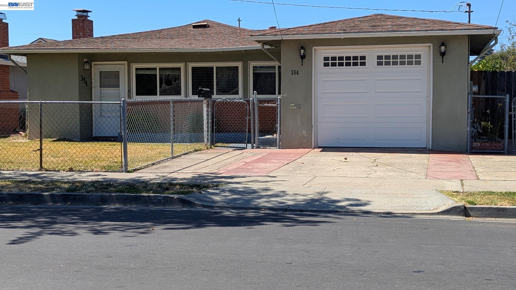 Welcome to 354 Berry Ave, a bright 3-bedroom, 1-bath single-family home offering 990 sq. ft. of comfortable, open-concept living on a generous 5,700 sq. ft. lot. Inside you'll find a warm living room anchored by a fireplace, dual-pane windows, central heat, hardwood floors, and a kitchen with stainless steel appliances. A detached bonus room in the backyard adds flexible space for a home office, gym, or studio, while mature fruit trees and a spacious yard make outdoor living easy. Life here is convenient by design. You're just minutes from Hayward BART station and I-880, with quick connections to I-238 and I-580 — putting Silicon Valley, Oakland, and San Francisco all within an easy commute. Hayward's revitalized downtown is a short drive away, along with convenient access to grocery stores, parks, library, schools, and Cal State East Bay. Comfort, space, and location — all in one address.