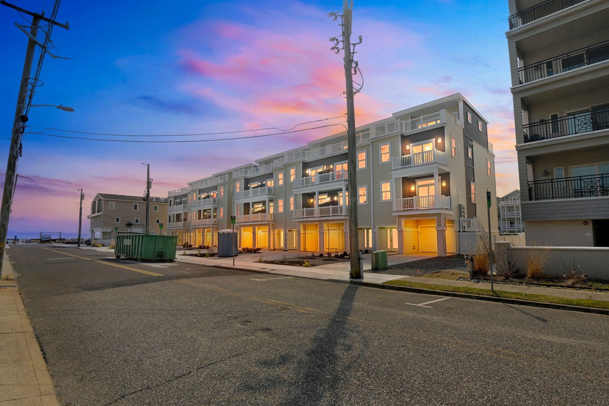 New Construction within steps of the beach In Wildwood Crest! This is an end unit with Ocean views from each level with a spectacular view on the large upper deck that connects to a great room with wine cooler, ice machine, dishwasher, sink and ample cabinet space. You will be greeted by beautiful landscaping and entrance to the first floor area that allows access to the garage, rear yard and storage area. The large foyer area takes you to the kitchen, dining room and living areas. You have access to the first deck with an ocean view. Going to the next level you will find a beautiful Primary Bedroom that has a beautiful deck with an Ocean view, plenty of storage and a wonderful full bath. This floor also features a beautiful hall bath and two bedrooms with closet space. The top level features a great room that will be an exciting family space due to the spectacular deck that gives a great panoramic view of the Ocean and Beach. It also features cabinet space, sink, dishwasher, wine cooler and icemaker. The unit has approximately 2100 square feet for interior and approximately 2600 square feet overall.