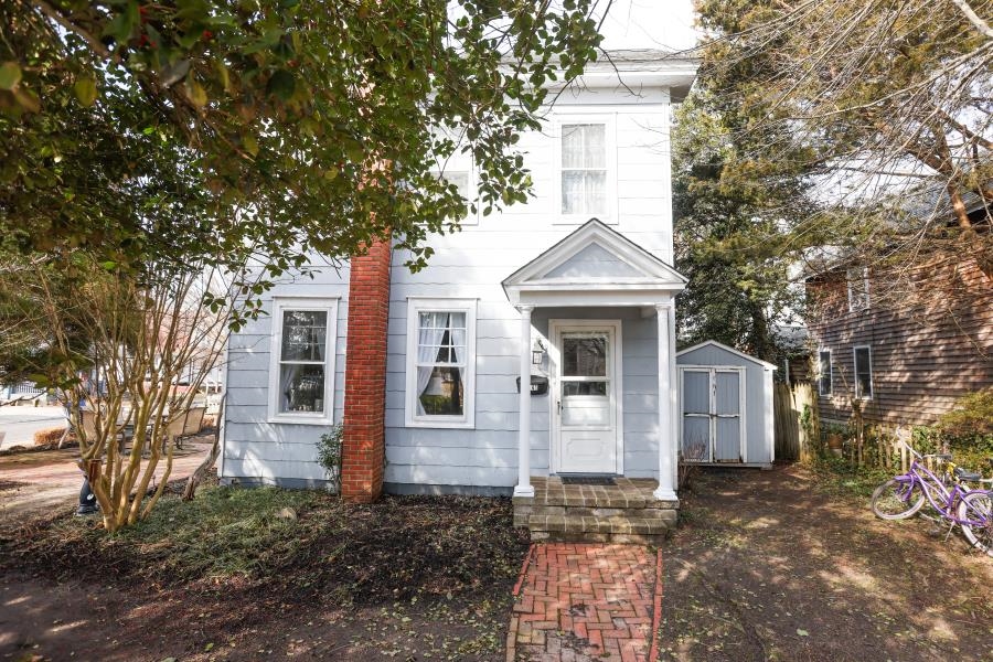 Prime location!!! This historic home nestled on beloved Pearl Ave. is everything you would dream of in a quintessential West Cape May home! A short walk to the beach, restaurants, coffee shops and town, this is an ideal location. Situated on a large lot, it can be accessed from the driveway on Pearl with the front of the home facing the adjacent paper street. You can enter through three separate entrances to the first floor which includes a grand living and dining area with 10 ft ceilings. The east facing sun porch is a perfect spot to cozy up with a cup of tea/coffee from morning till afternoon, and the small library/den has a game table -perfect for unplugging from the matrix with your family/friends. There is a large laundry area and you will adore the vintage style "unfitted" kitchen.   The main staircase leading to the second floor, will bring you to the master bedroom which has an adjacent sun porch set up as an artist's studio. Attached, is a full bath with an antique clawfoot tub. There are two more bedrooms on the second floor with another staircase that leads from the back bedroom to the pantry/laundry room.  Climb on up to the third floor which is set up as a dormitory style bedroom. There are so many twists and turns in this home, it feels like a little adventure back in time! Lastly, you have a lovely, landscaped yard and brick patio area perfect for honing your gardening skills, dining/entertaining al fresco, and evenings around the fire. This property is ideal if you are looking for a place where you can retreat to, relax and reset! Come see for yourself this Saturday 2/14 OPEN HOUSE!! 12pm-3pm