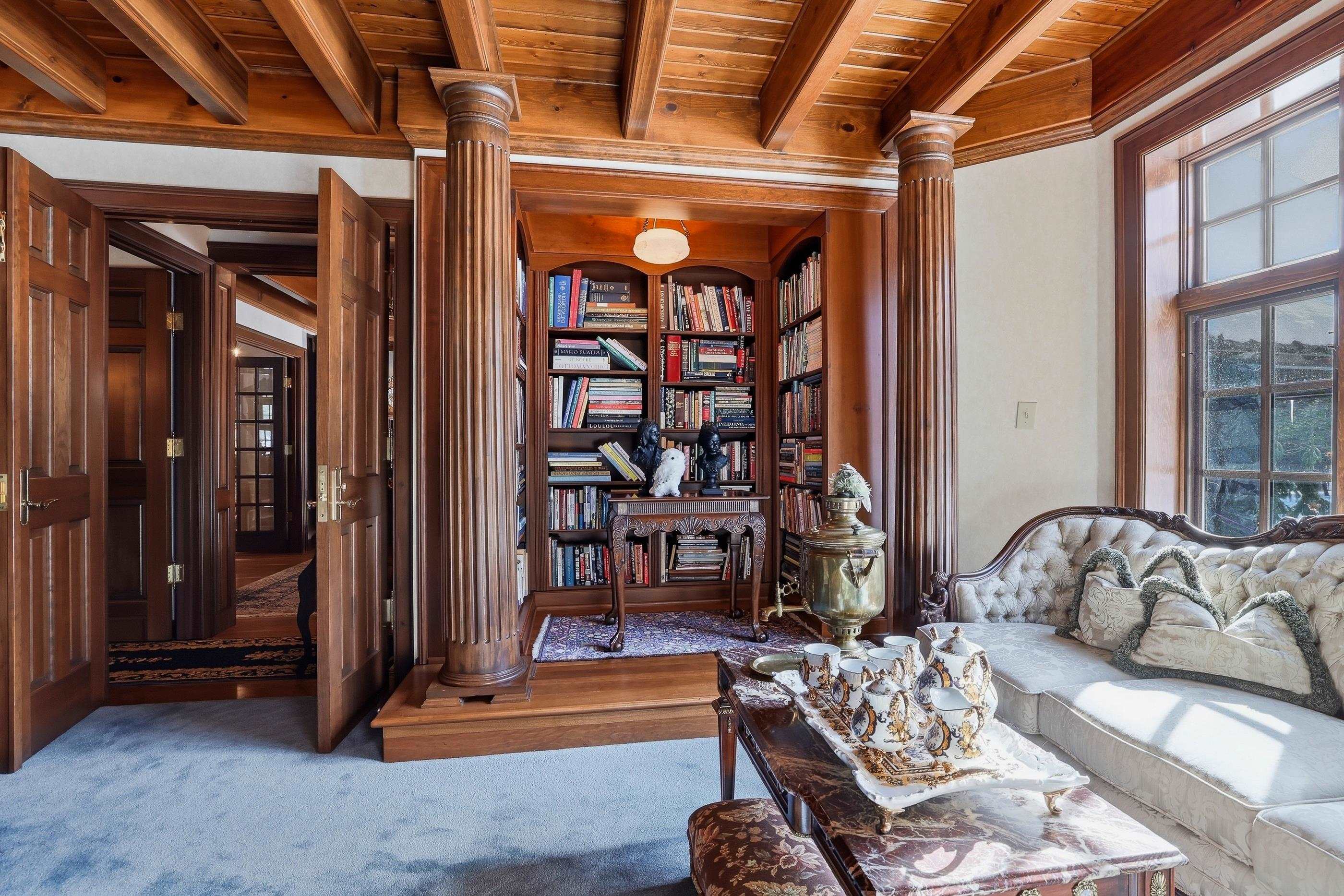 There is wiring for a sauna behind this bookcase, can be converted to a sauna.