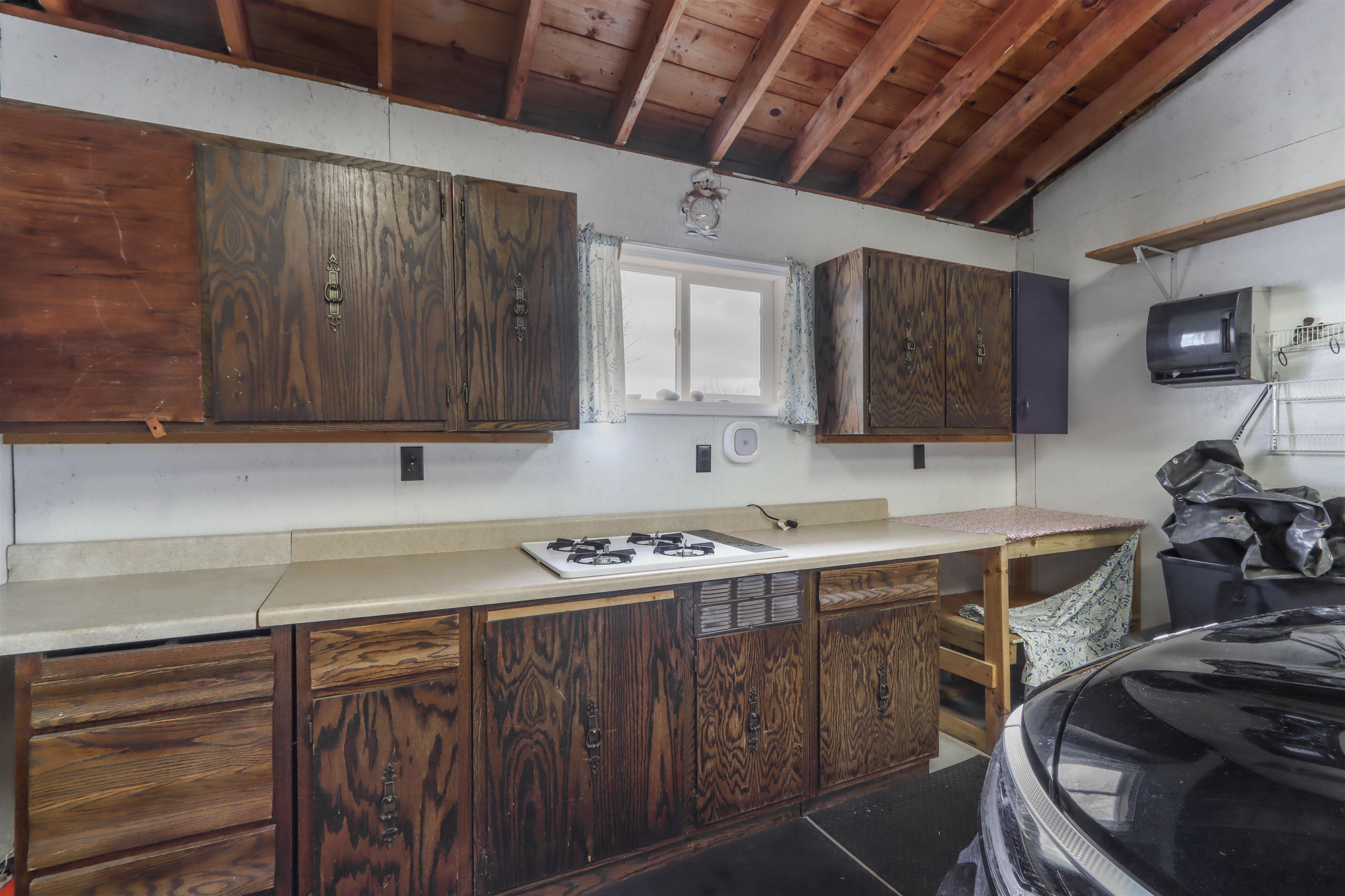 Upper and Lower Cabinetry and Cook Top Stove