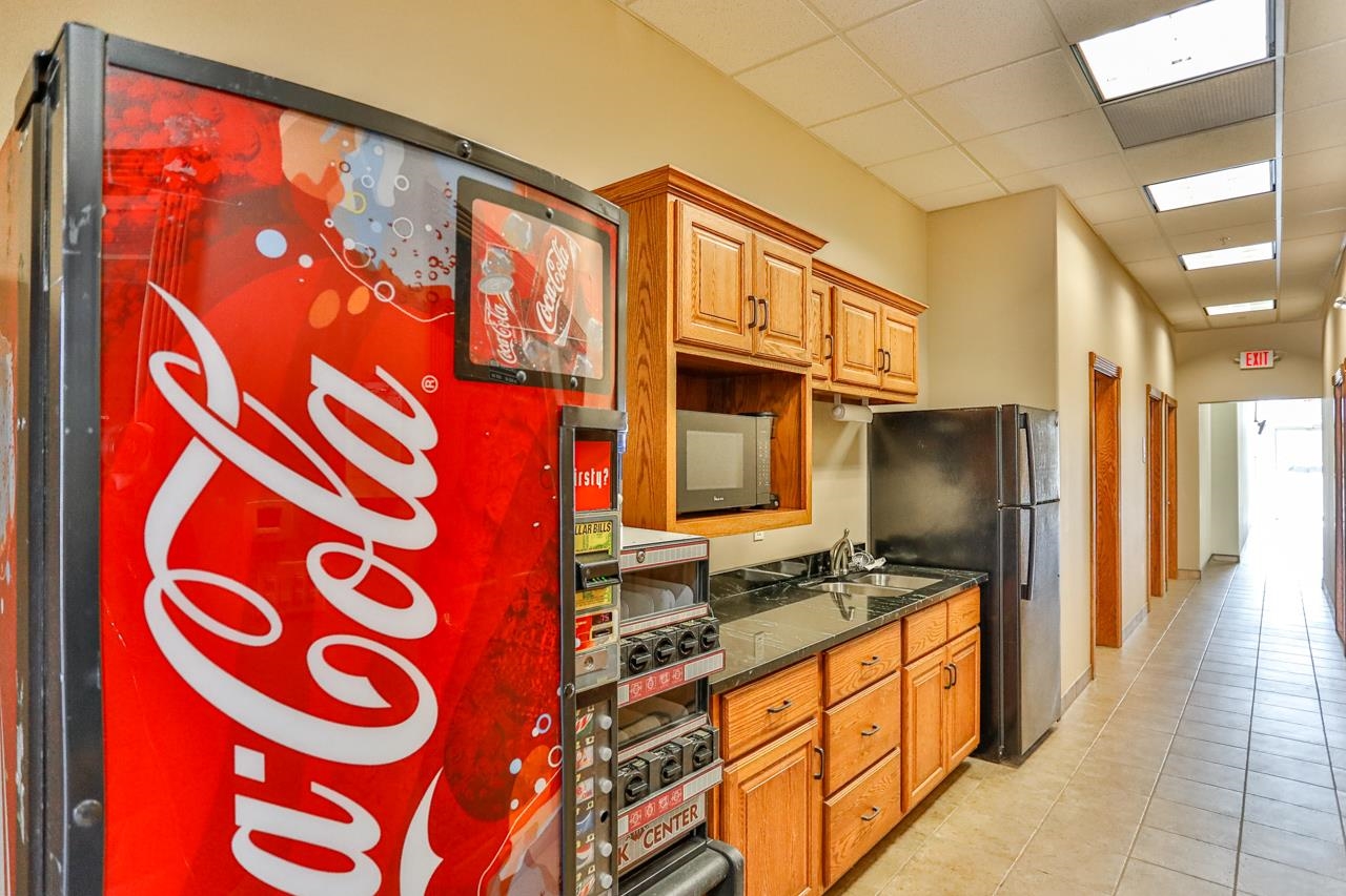 219 ROSS AVENUE, Schofield, Wisconsin 54476, ,Commercial/industrial,For Rent,219 ROSS AVENUE,22601352