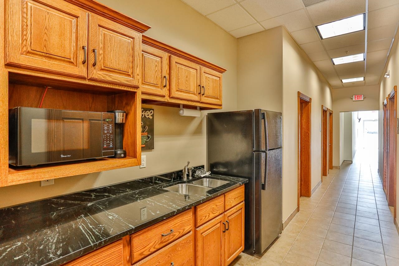 219 ROSS AVENUE, Schofield, Wisconsin 54476, ,Commercial/industrial,For Rent,219 ROSS AVENUE,22601352