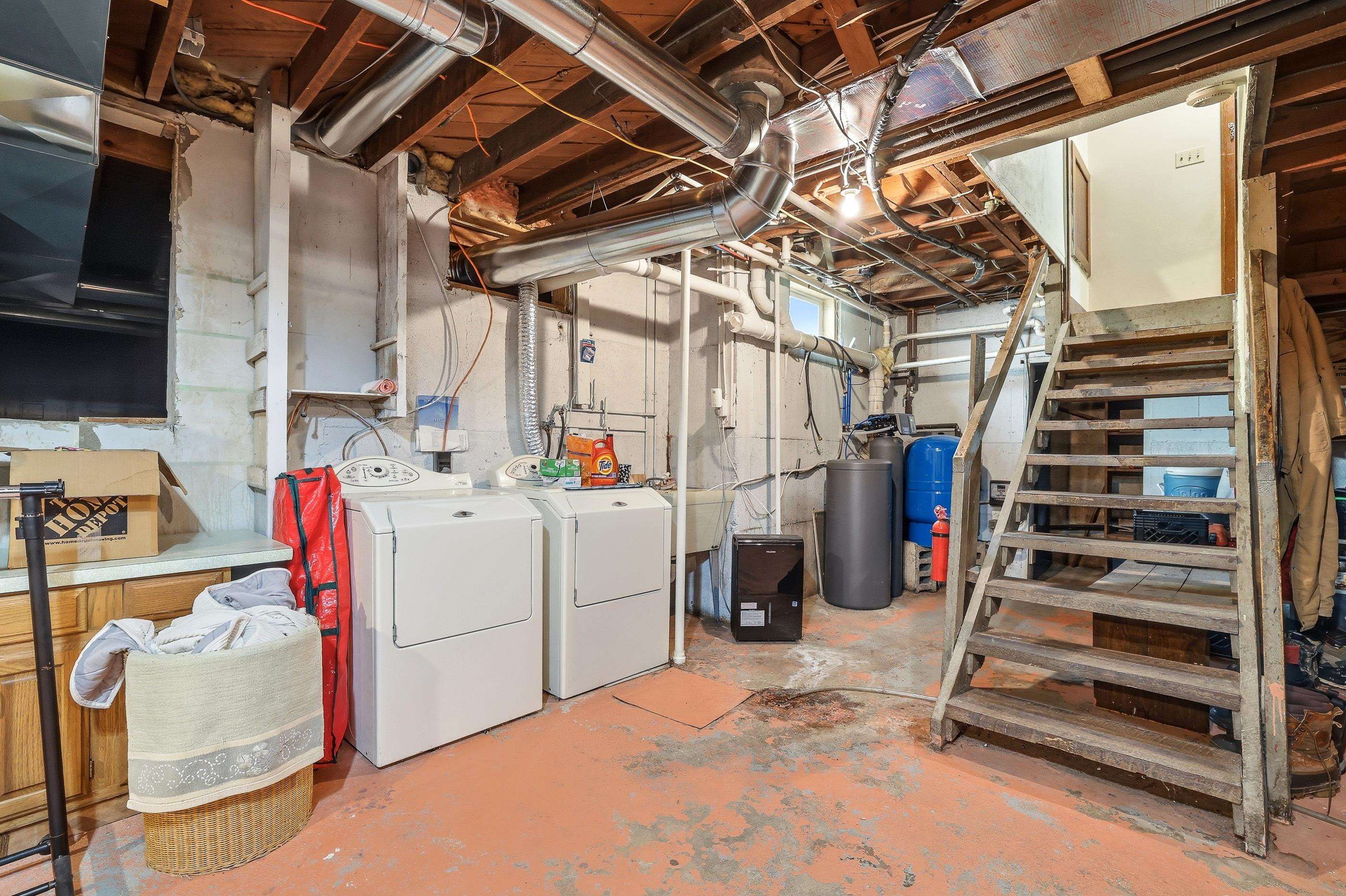 Basement with laundry hook-up. This washer & dryer are being sold with the house.
