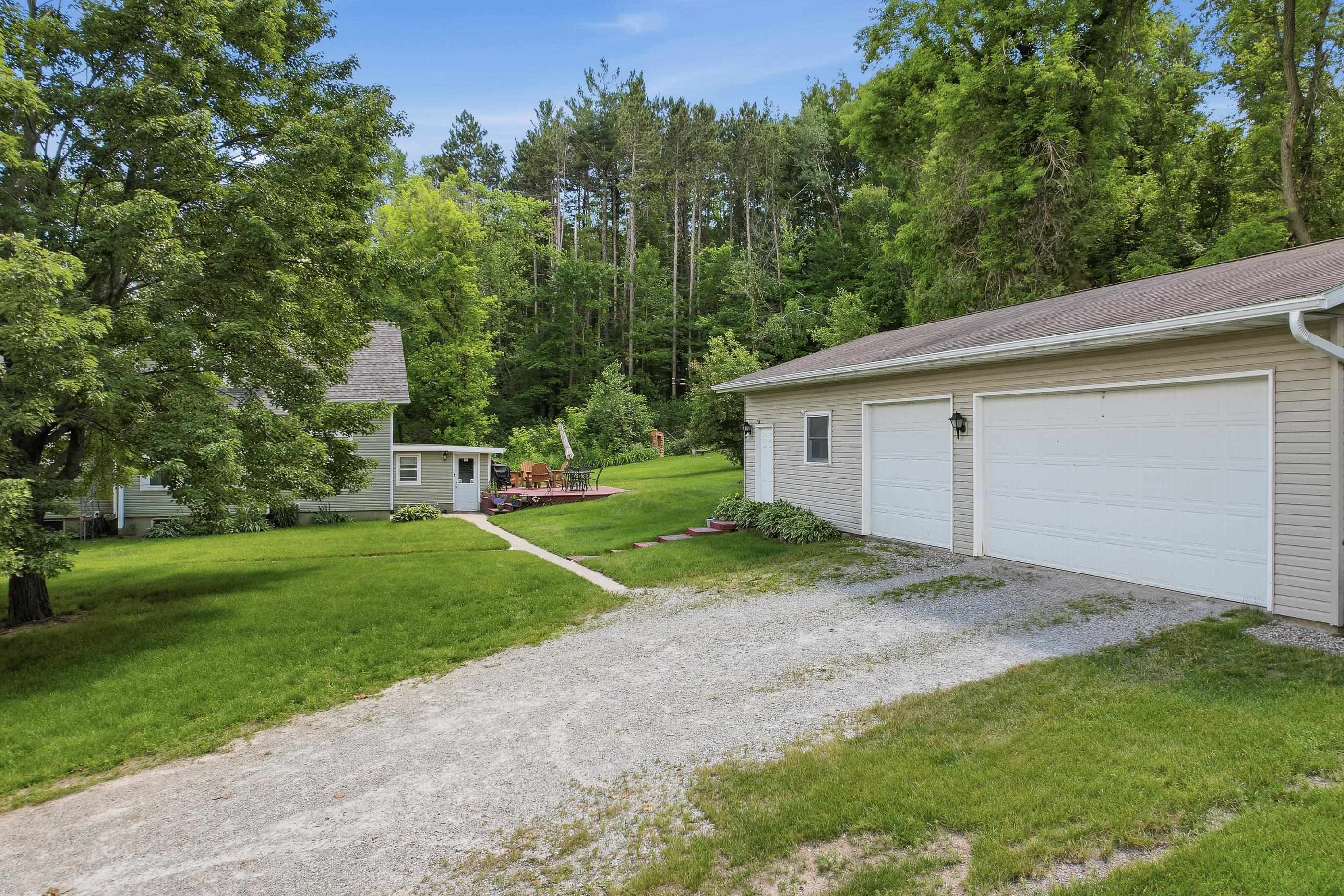 3 stall garage with heated workshop. Entire building is insulated.
