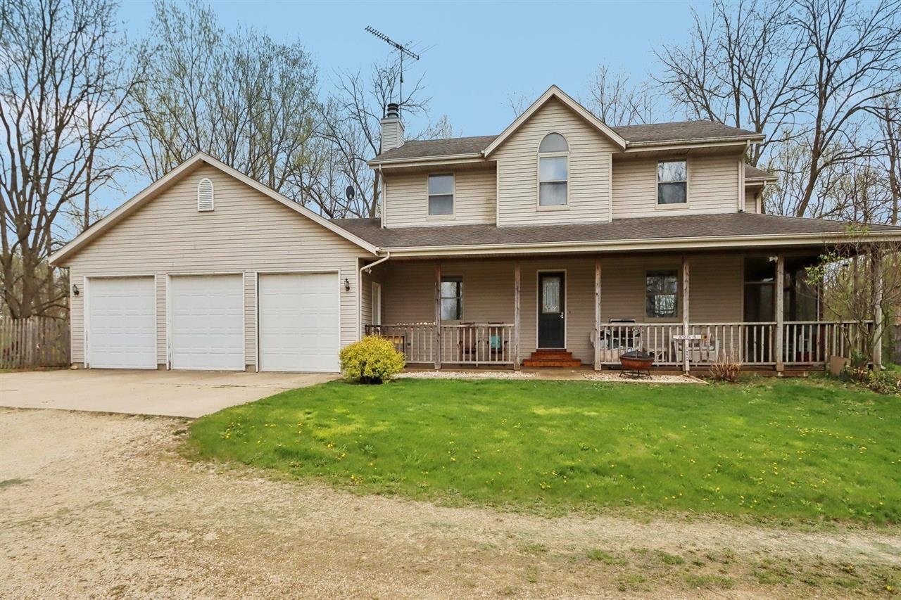 Fisherman's Paradise! Fully stocked 30' deep pond/lake w/private island. How fun would a zipline be?! Large 2 Story home w/gorgeous wrap around front porch. Extra big 3 car (4 tandem) attached garage w/attic storage. Supersized kitchen w/breakfast bar, pantry. Main level family room (w/fireplace) & separate living room. Formal dining room plus a dinette area. Bedrooms plus cozy reading nook/loft area on 2nd floor. 2nd floor laundry room conveniently located near bedrooms. Large master bedroom suite w/separate shower w/double shower heads, big jetted tub. Knotty pine rec room/office in basement w/lots of square footage left to finish. Roughed for 4th bath. Beautiful 5 stall horse barn (24x36) w/ concrete floor & extra tall garage doors at each end. Trails throughout the 18.75 acres.  Gorgeous property!