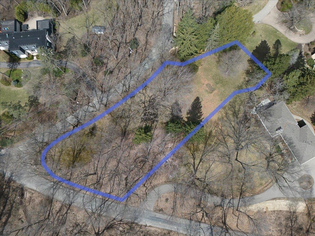 Rare opportunity to build in the highly sought-after Highlands neighborhood. This 0.76-acre wooded lot offers a private, natural setting with mature trees and generous spacing between homes. Ideal topography allows for a full walk-out basement, maximizing light and views. Bring your own builder and design a custom home that fits your vision. This large, mostly level lot fits perfectly into the neighborhood’s spacious, park-like character. Enjoy the tranquility of this unique setting while being just minutes from all that Madison has to offer.