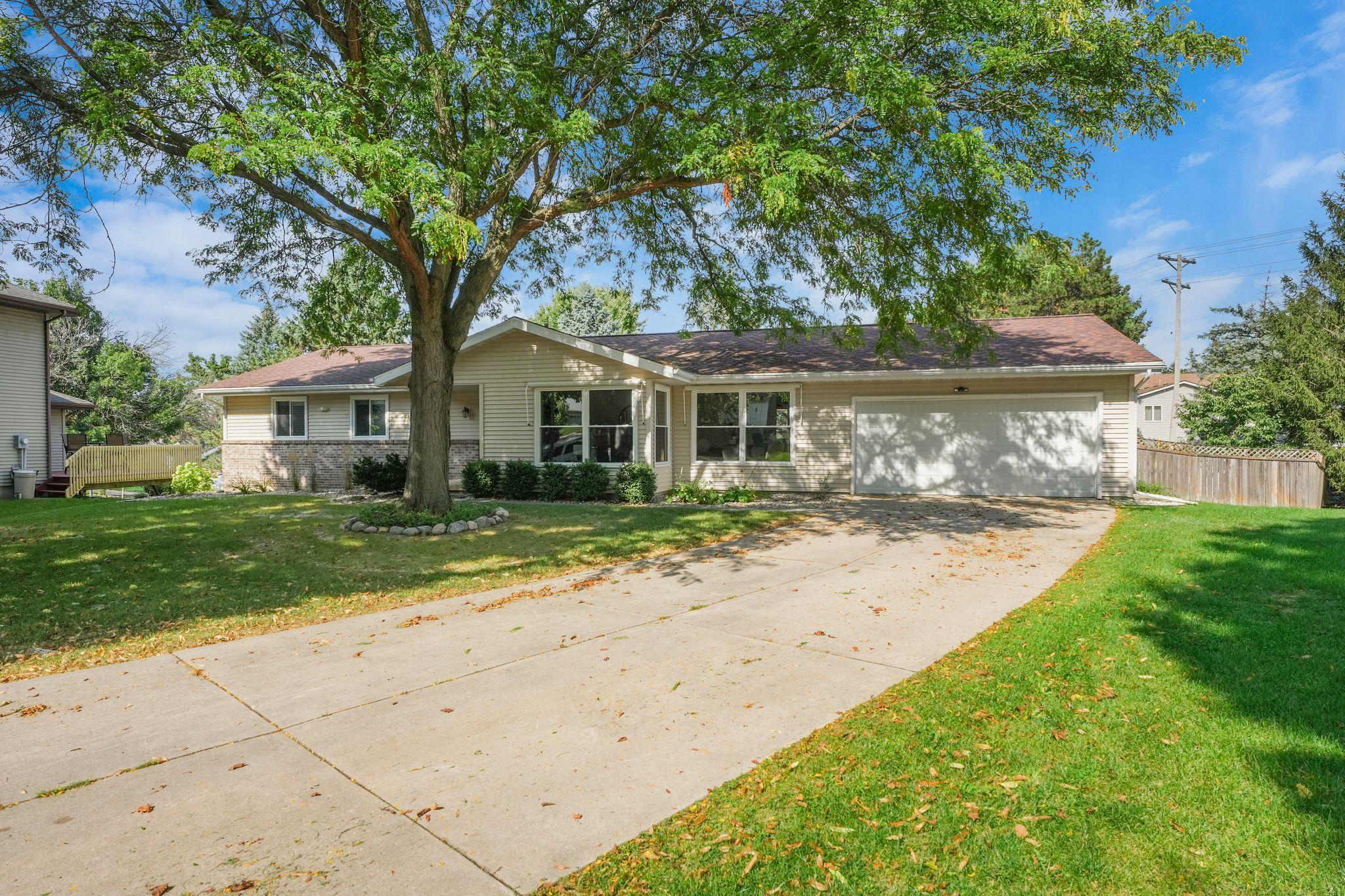 Show 9/11. Sprawling 3,500+sqft ranch tucked away at the end of a quiet cul-de-sac in Madison's incredibly convenient west side! Set on a huge .35-acre fenced lot, this home offers plenty of room to stretch, both inside and out. The spacious main level features an easy-flowing floor plan with generous living spaces, a fireplace, 3 bedrooms, and 2.5 baths. Step outside to the expansive deck overlooking the level, private backyard - an increasingly hard-to-find setting in the city.  The exposed lower level offers direct walk-out access to the backyard, a bonus kitchen/wet bar, rec room + an additional bedroom and full bath! The attached 2-car garage, level driveway and fantastic location near parks, schools, shopping and everyday conveniences, with easy access throughout Madison and to the west side/Epic completes this spectacular property.  A rare combination of space, privacy and convenience!