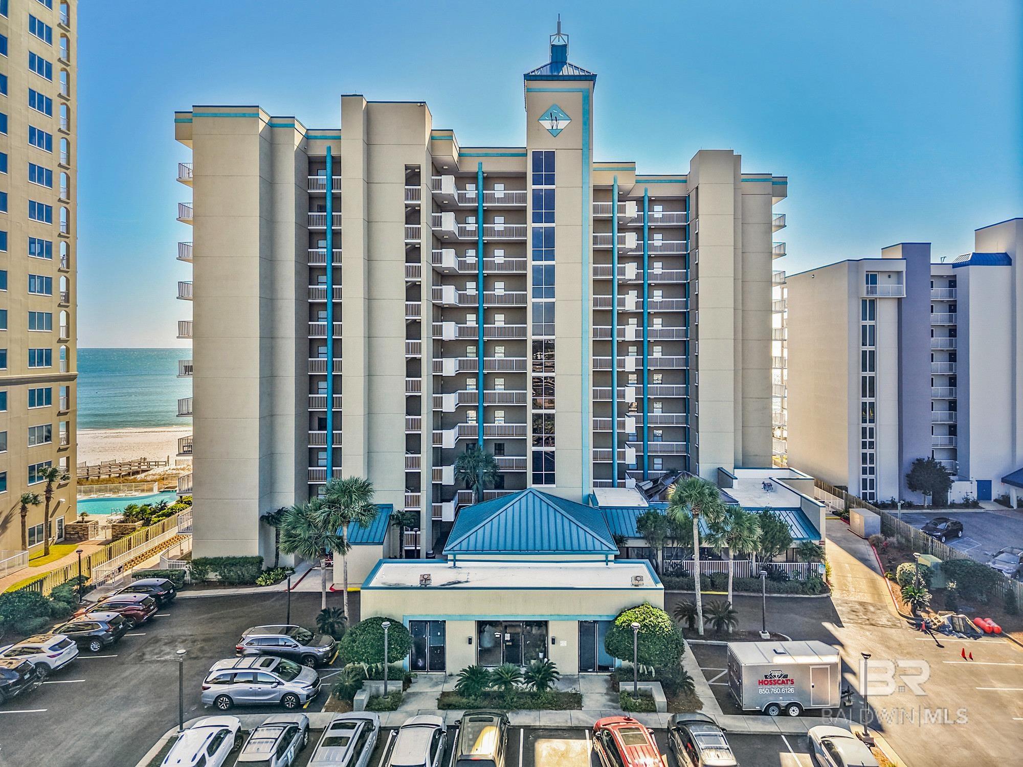 Wake up to endless Gulf views in this beautifully appointed 3-bedroom, 2-bath beachfront condo, perfectly positioned directly on the sugar-white sands of Orange Beach.  Located in highly sought-after Romar Place Condominiums, this residence offers front row Gulf views that are nothing short of breathtaking.  The interior was thoughtfully updated in 2018 and showcases new flooring, updated cabinets and countertops, stainless steel appliances, fresh paint, elegant crown molding, and a spacious primary bathroom featuring a large walk-in shower.  Remote controlled blinds enhance comfort and convenience while allowing you to fully enjoy the coastal scenery.  Exterior windows along the breezeway are tinted, providing added light protection without compromising the bright, airy feel of the home.  The condo has never been used as a rental and has been meticulously maintained.  Whether you're enjoying sunrise coffee or sunset cocktails, the unobstructed Gulf-front views create a truly unforgettable setting.  Romar Place is known for its prime beachfront location and relaxed coastal atmosphere -- making this an exceptional opportunity to own a slice of Orange Beach paradise.  Schedule your private showing today. Buyer to verify all information during due diligence.