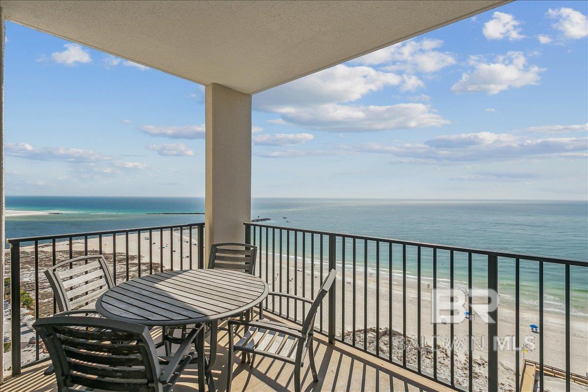 15th FLOOR, GULF FRONT CONDO (top, penthouse-level) one-bedroom, one-bath condo at the Phoenix East II. This unit has stunning, unobstructed panoramic views of the Gulf and Perdido Pass directly from the private balcony. Priced attractively to reflect the opportunity for personal updates & enhancements, it presents excellent value for a buyer seeking a beach retreat or investment property in a prime location. The unit has 9' ceilings, comfortably sleeps up to 6 and features a spacious living area, Lazy-Boy pull-out couch equipped with a memory foam mattress, a full-size Murphy bed for flexible sleeping arrangements, and direct bedroom access to the full bathroom for added convenience. Additional highlights include an in-unit full-size washer and dryer in a dedicated laundry closet, granite countertops in the kitchen and bathroom, and stainless steel refrigerator, microwave, and oven/stove (all approximately 5 years old). The A/C system was replaced in 2020! Currently operating as a successful vacation rental, this unit has demonstrated strong performance with 2025 gross rental income of $37,058 and current 2026 bookings already at $14,179 and continuing to build. Phoenix East II offers an impressive array of resort-style amenities, including direct beach access via a private boardwalk, outdoor zero-entry pool, heated indoor pool, hot tub, sauna, fitness center, tennis courts, basketball court, and picnic/grilling areas.  Buyer to verify all information during due diligence.